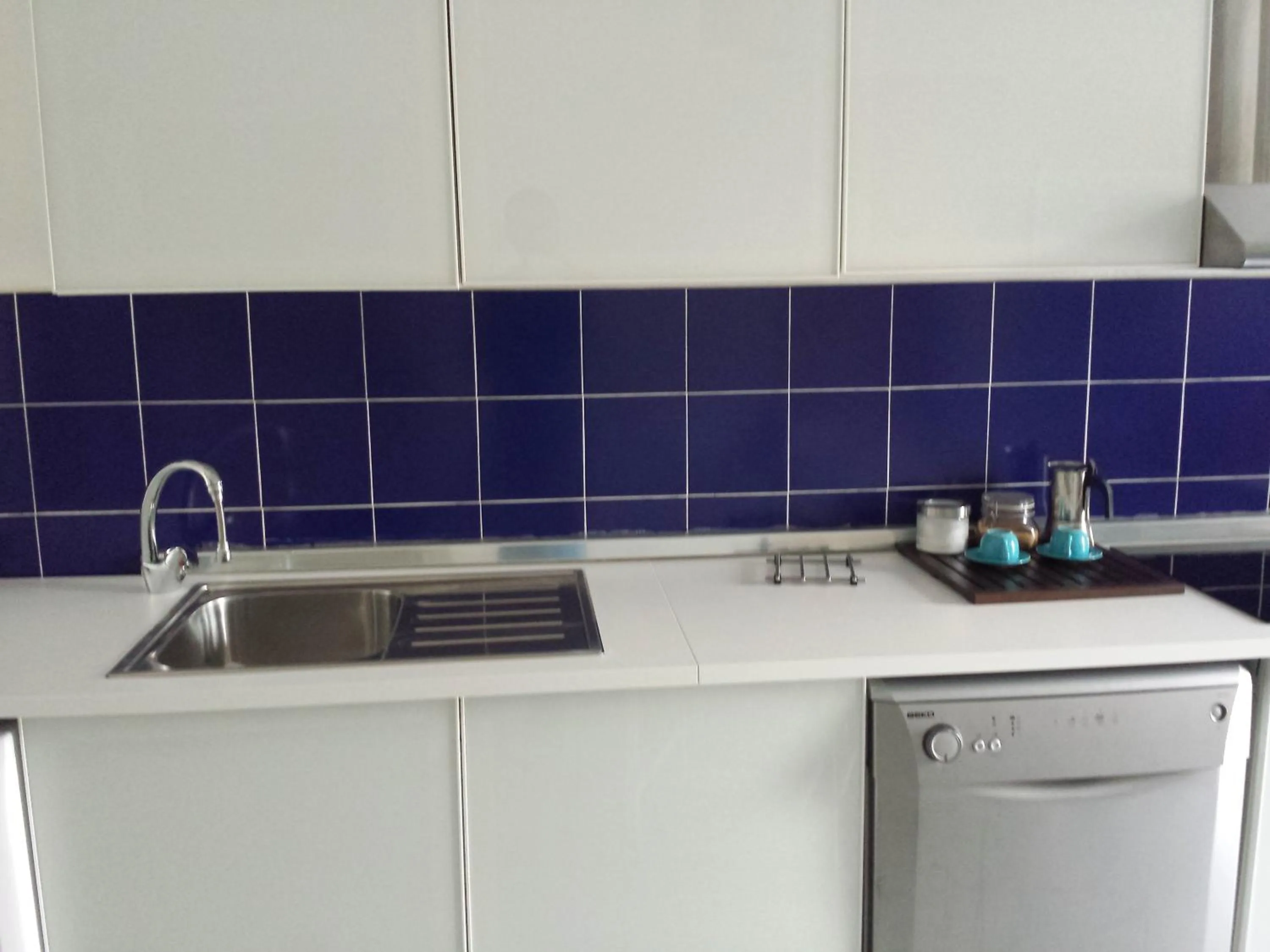 Kitchen or kitchenette in Aparthotel Masseria Villa Marchesi