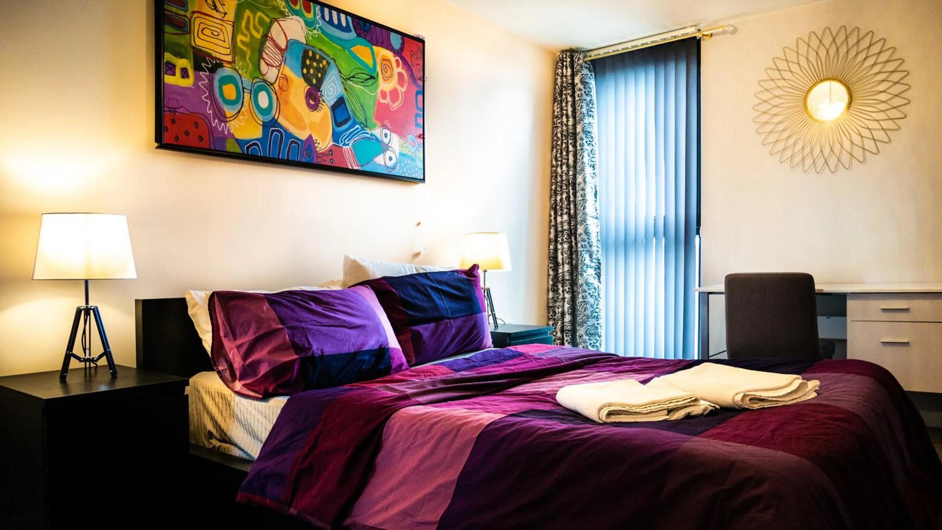 Bed in Beyond Blonk Apartments