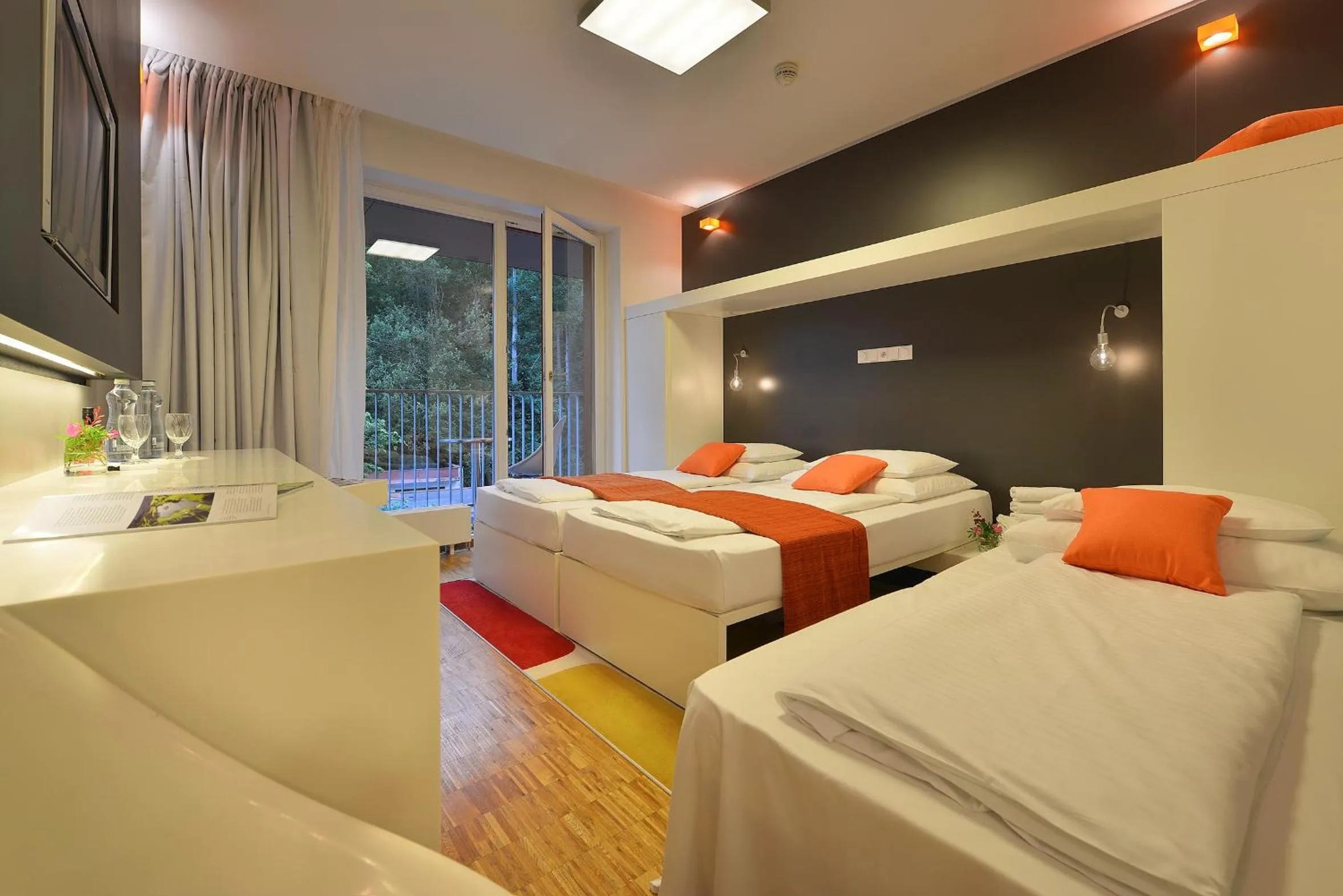 Bed in Omnia Hotel Relax & Wellness