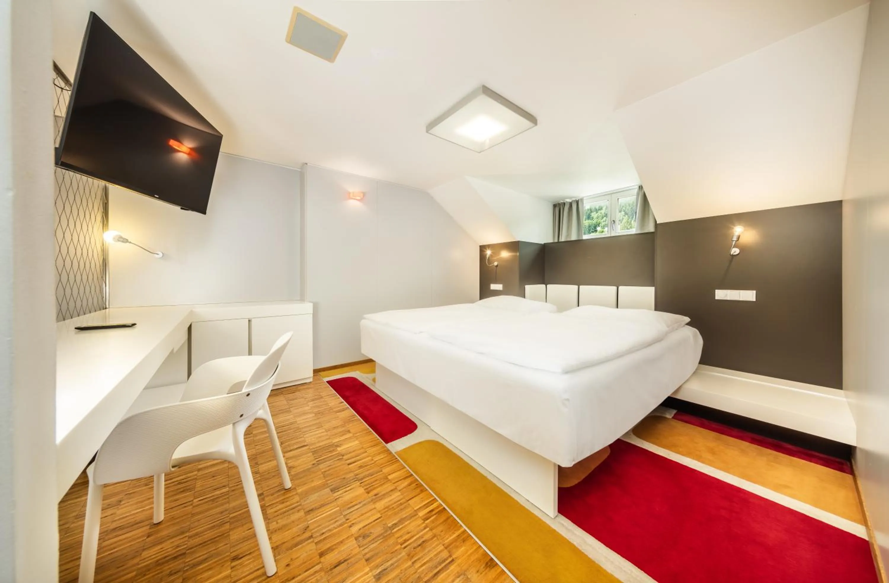 Bed in Omnia Hotel Relax & Wellness