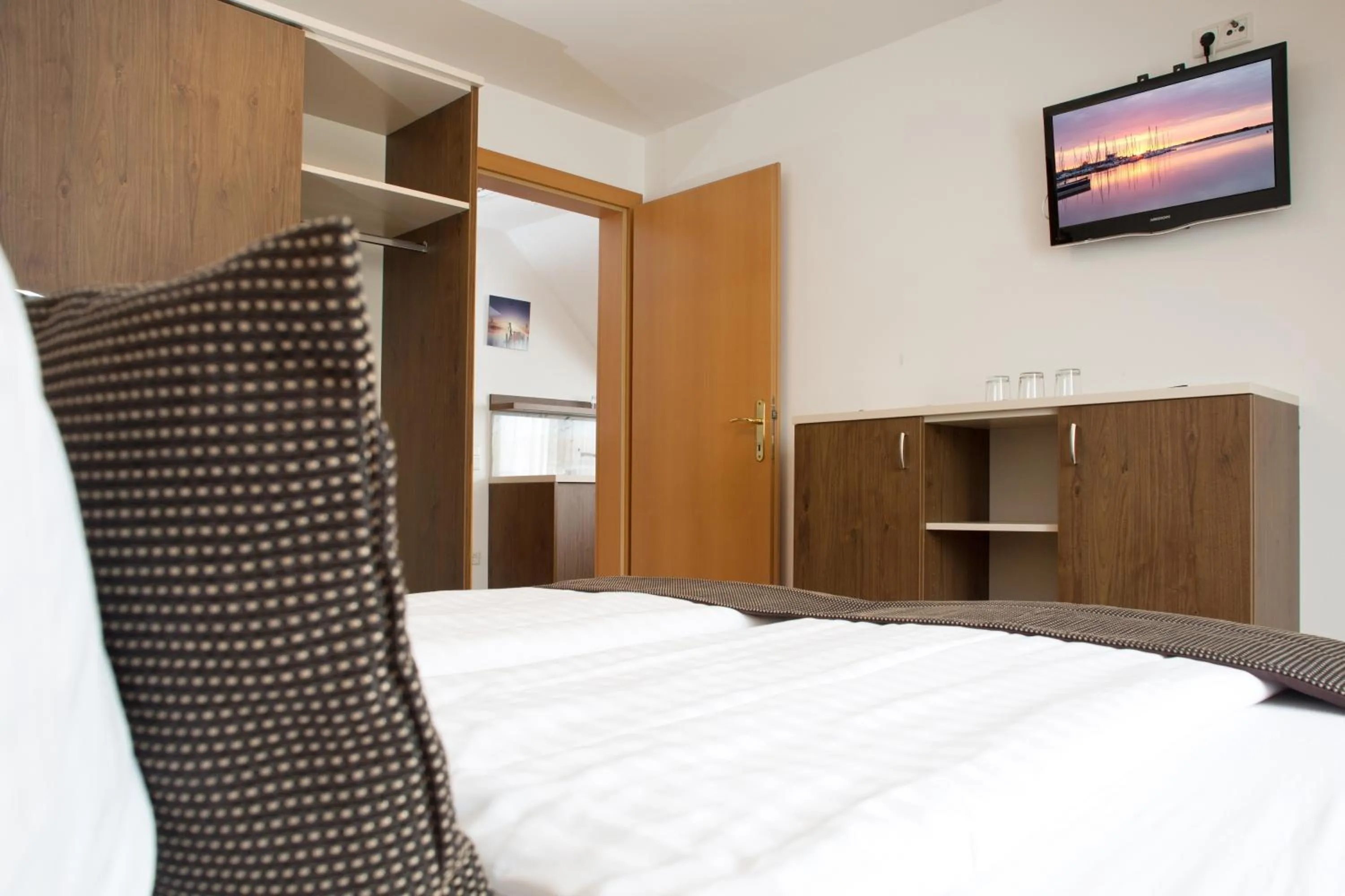 Photo of the whole room, Bed in Hotel am See Rust