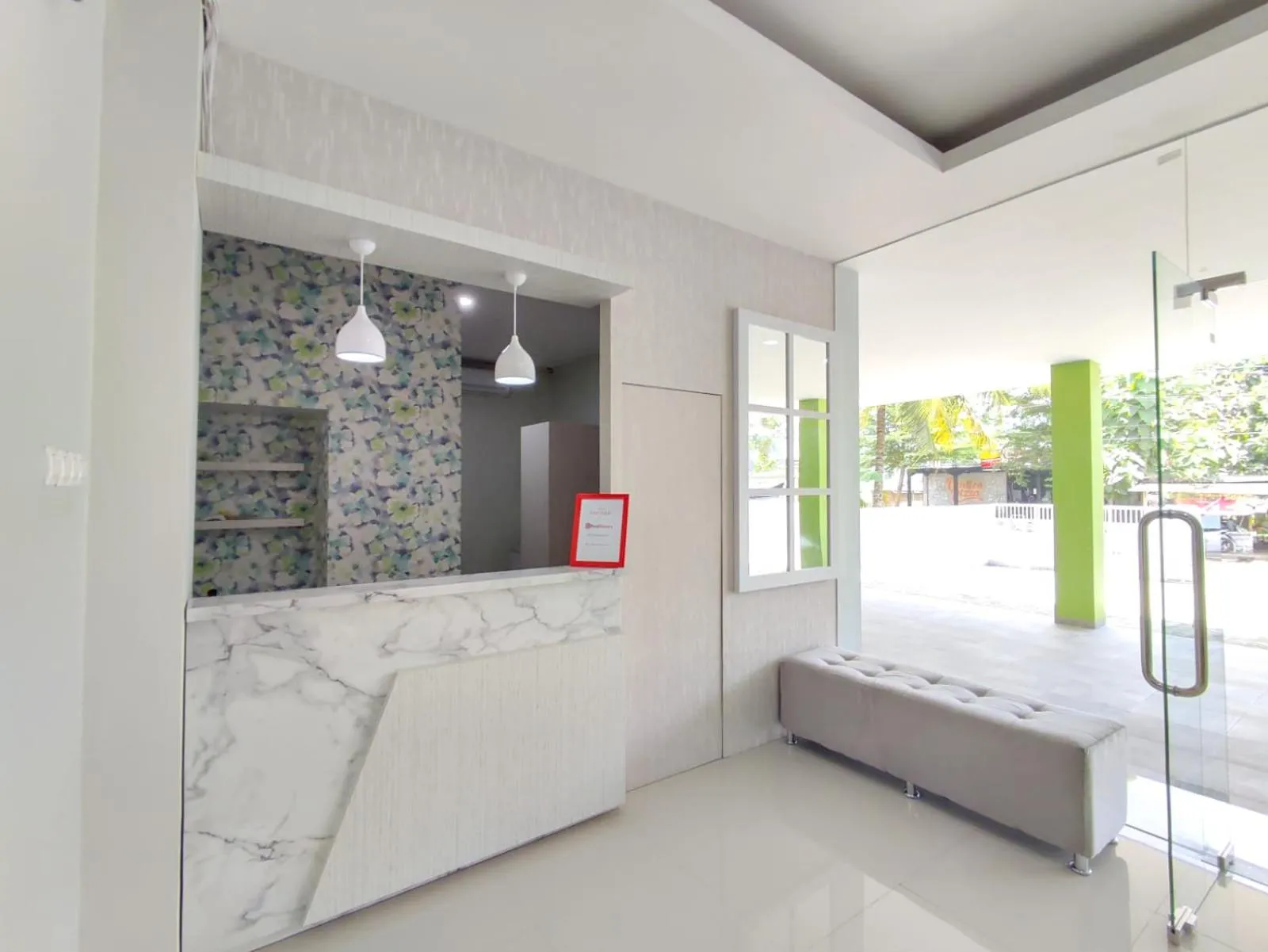 Bed in RedDoorz Syariah near GOR Satria Area