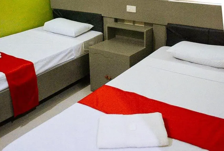 Bed in RedDoorz at EM Pensiontel Butuan City Bed in RedDoorz at EM Pensiontel Butuan City