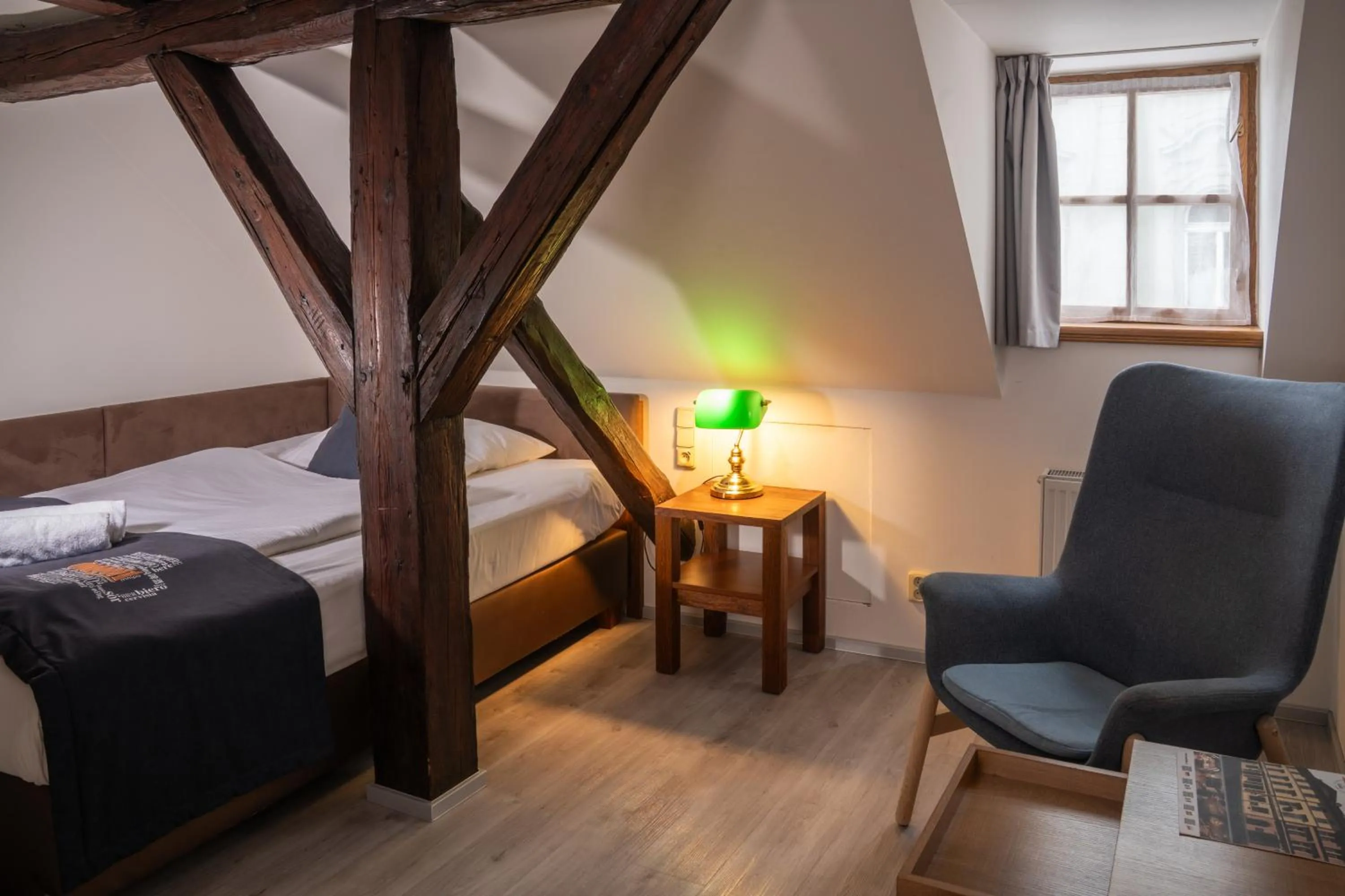 Bedroom, Bed in U Medvidku-Brewery Hotel