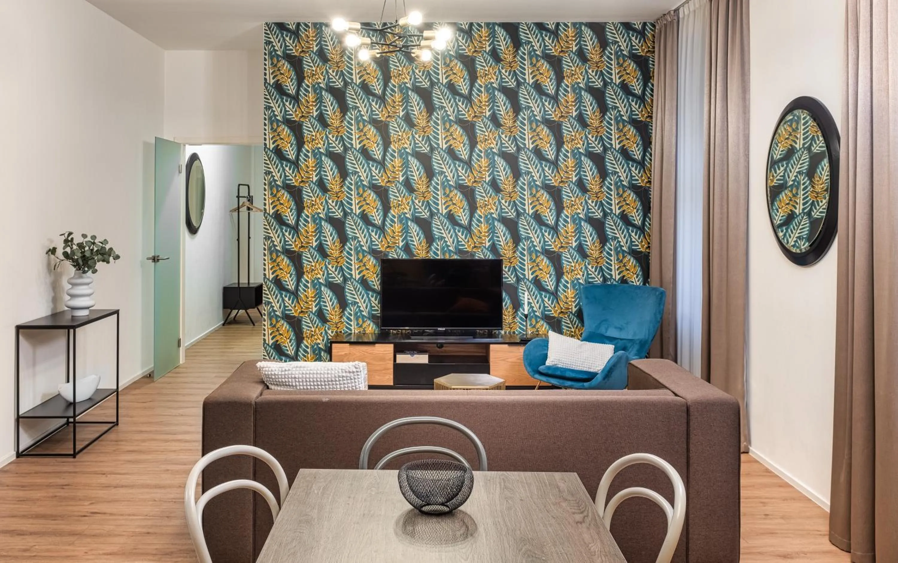 Communal lounge/ TV room in VN48 Suites by Adrez