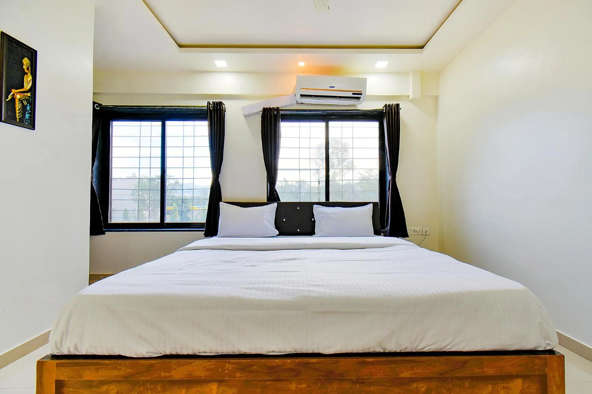Bed in FabHotel White House - Nr Sinhagad speciality Hospital