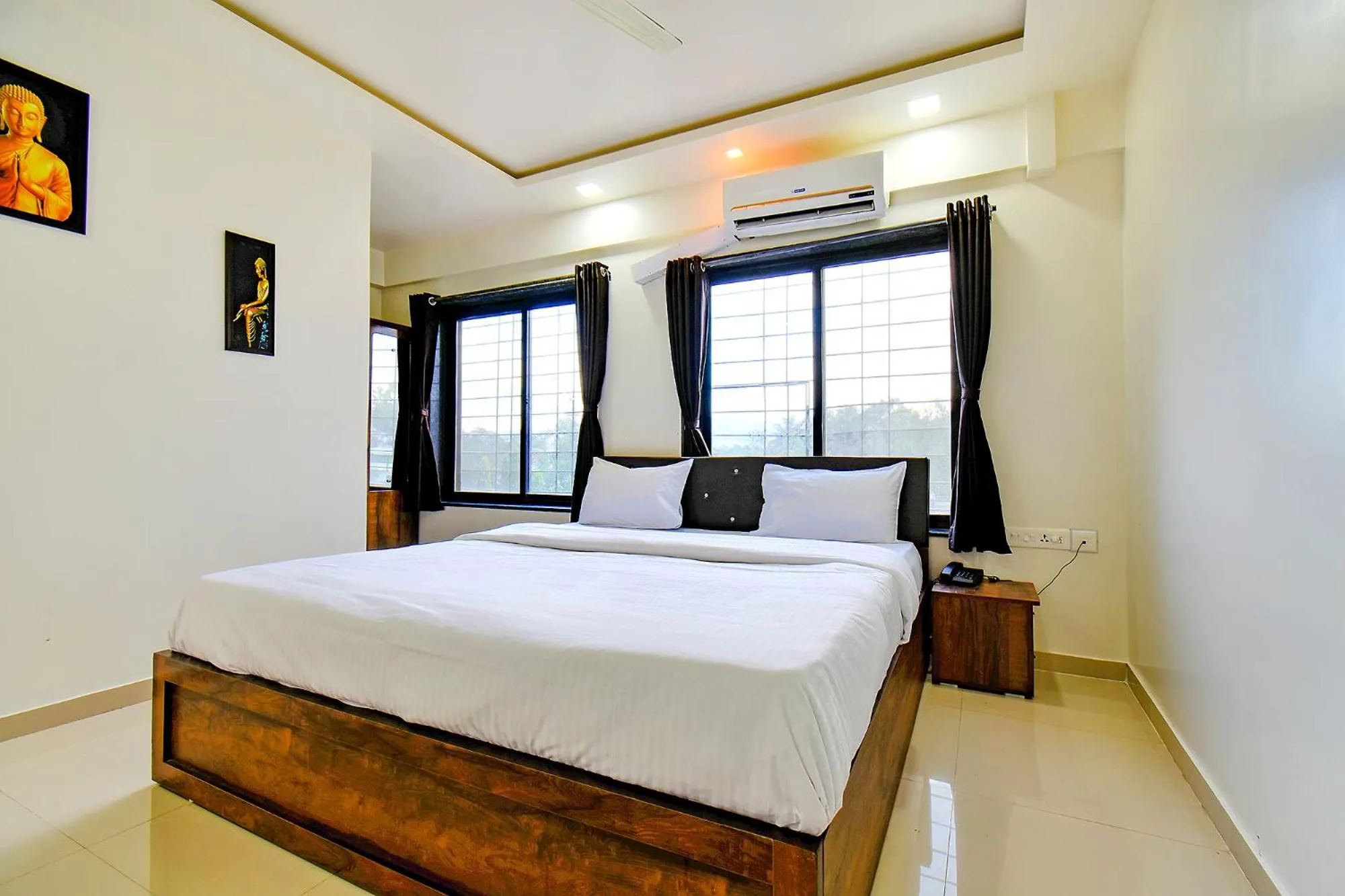 Bed in FabHotel White House - Nr Sinhagad speciality Hospital