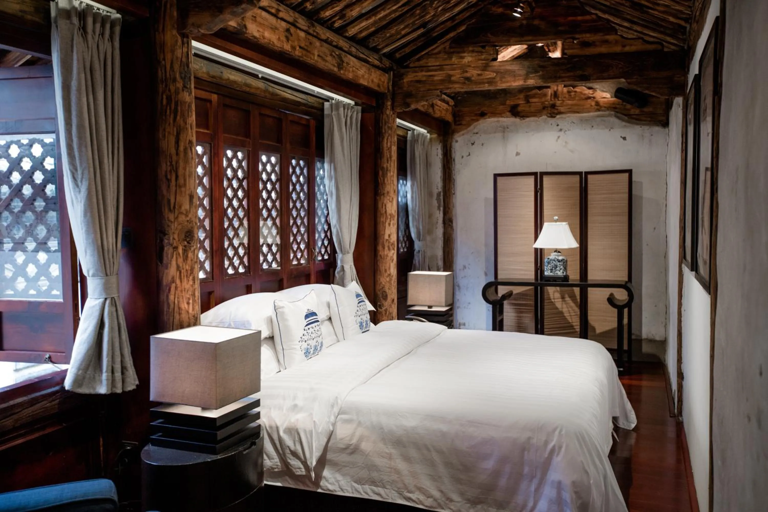 Decorative detail, Bed in Dali Sky Valley Heritage Boutique Hotel