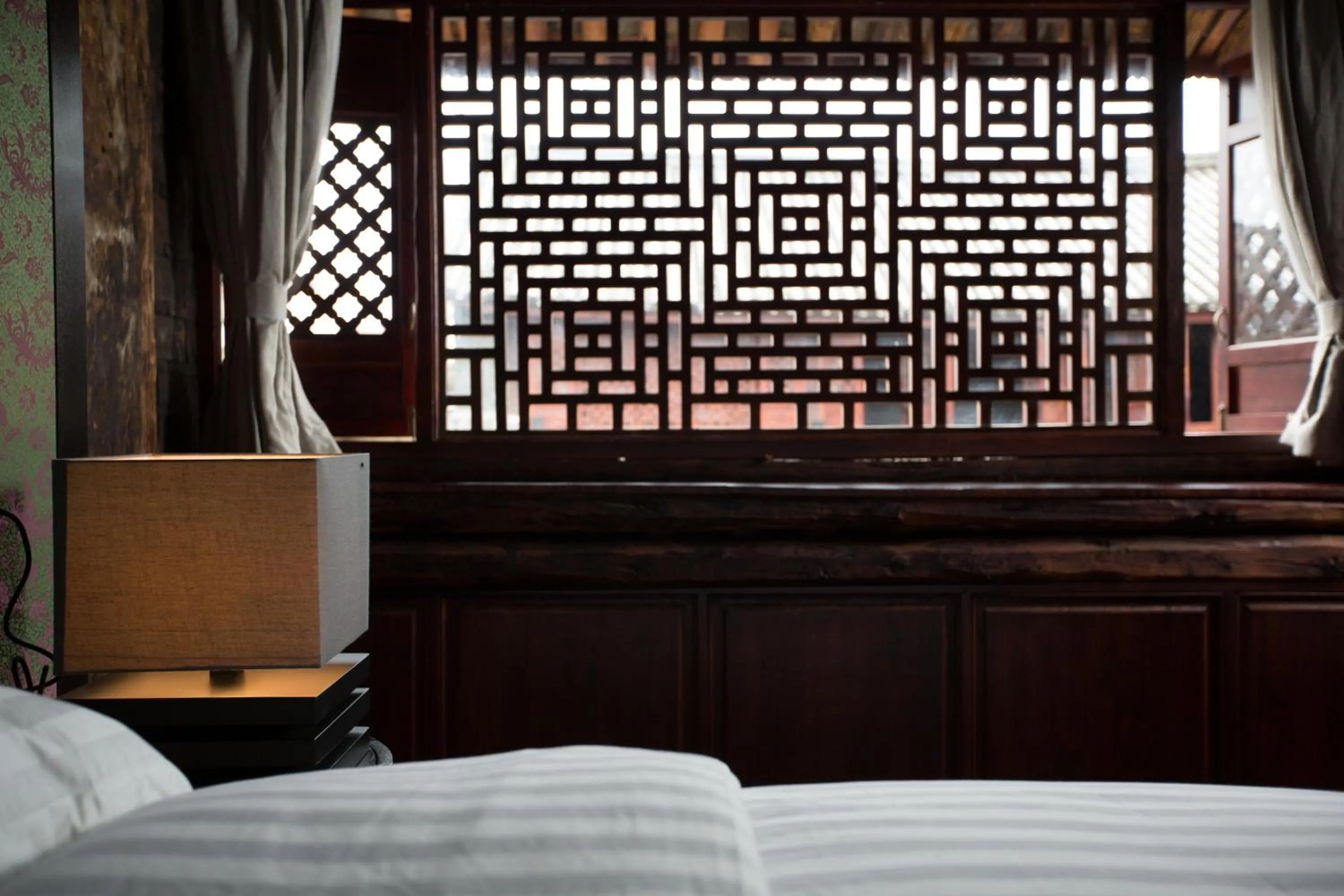 Decorative detail, Bed in Dali Sky Valley Heritage Boutique Hotel