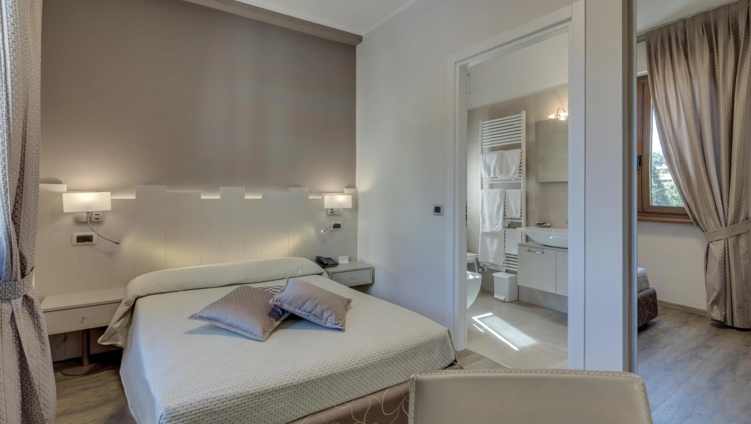 Bed in Albergo Milano