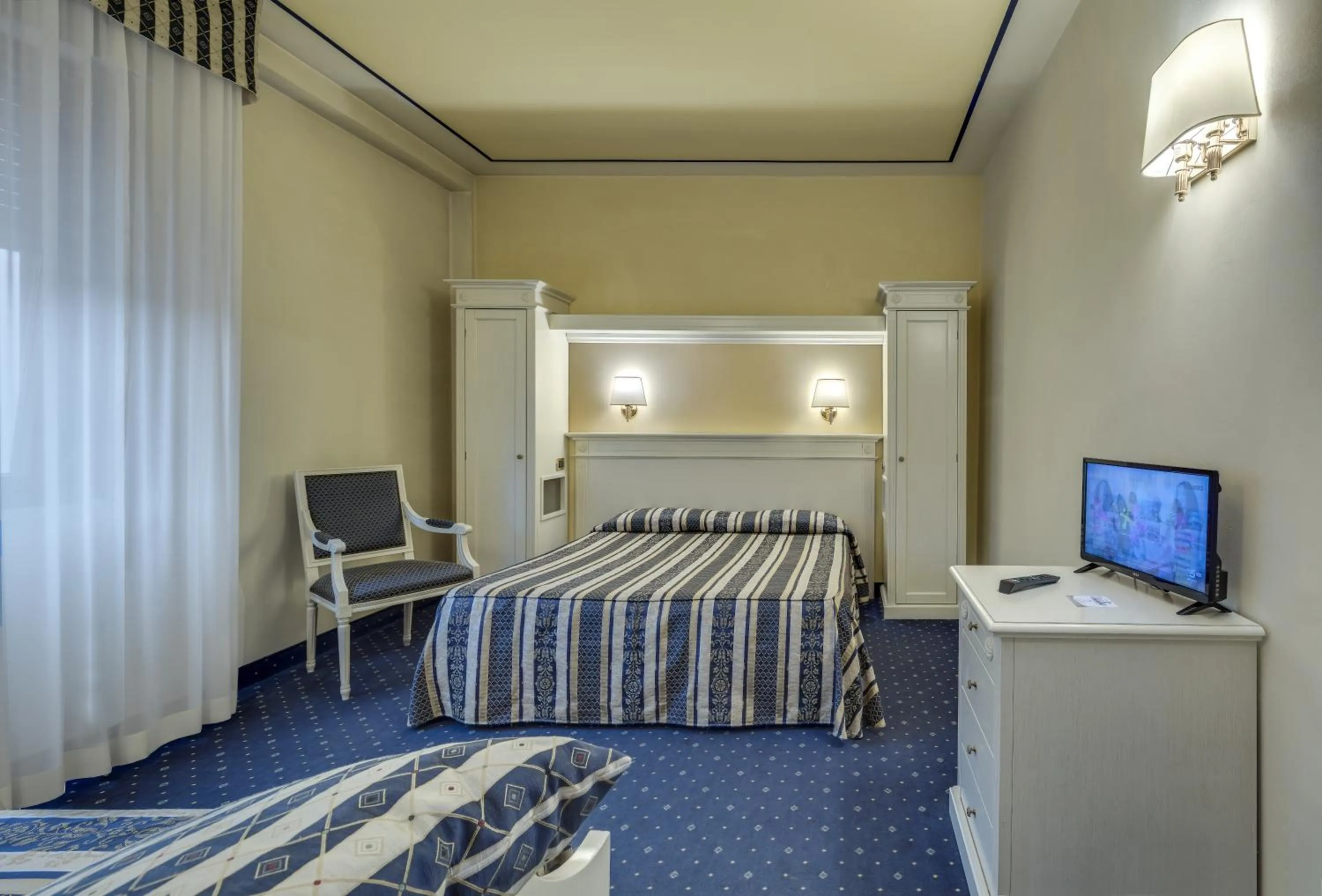 Bed in Albergo Milano
