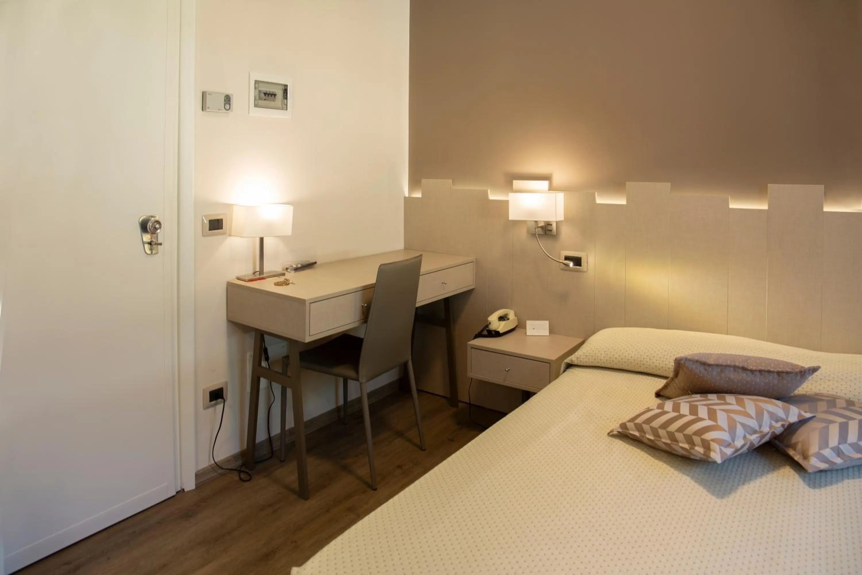 Bed in Albergo Milano