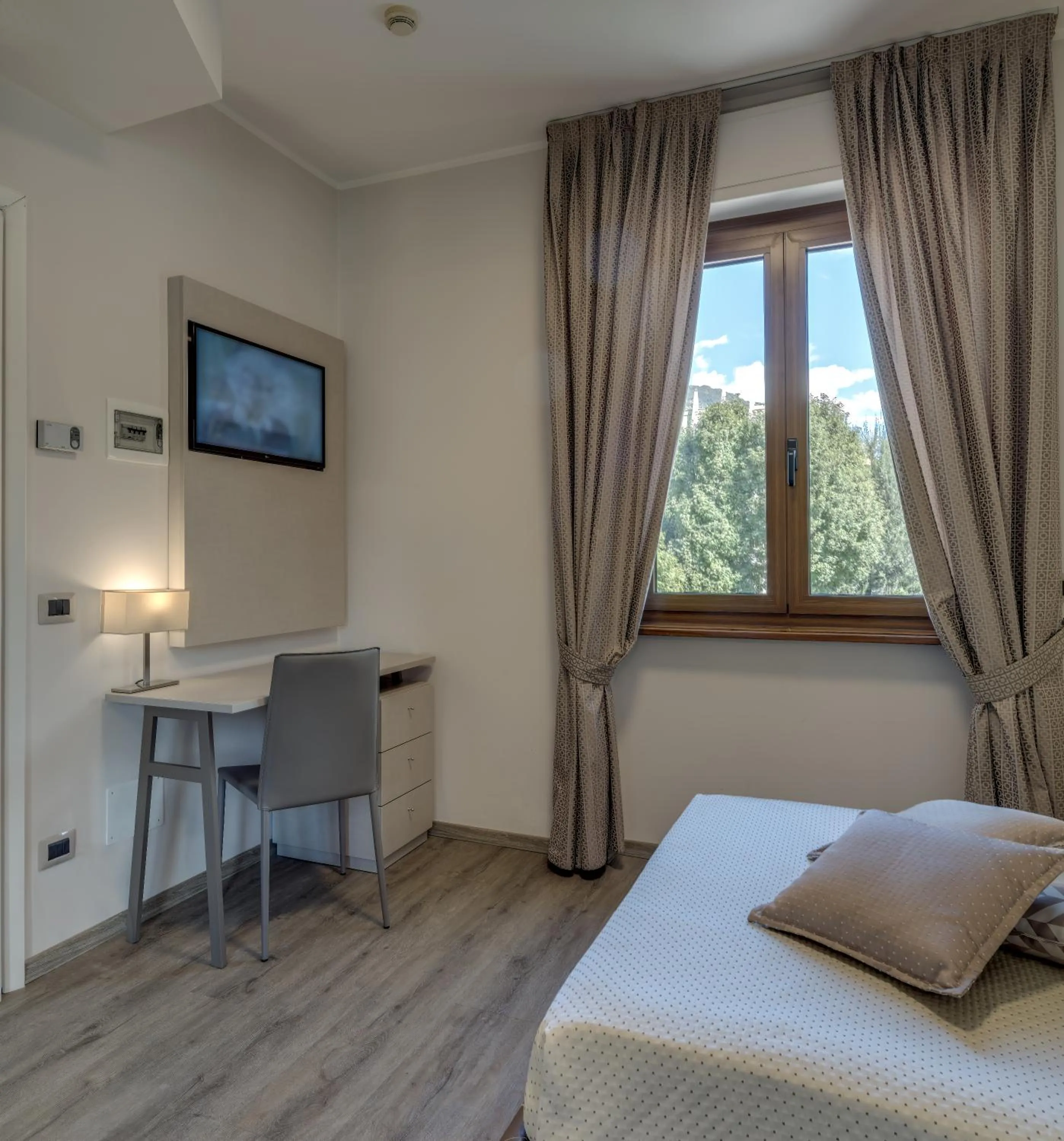 Bed in Albergo Milano