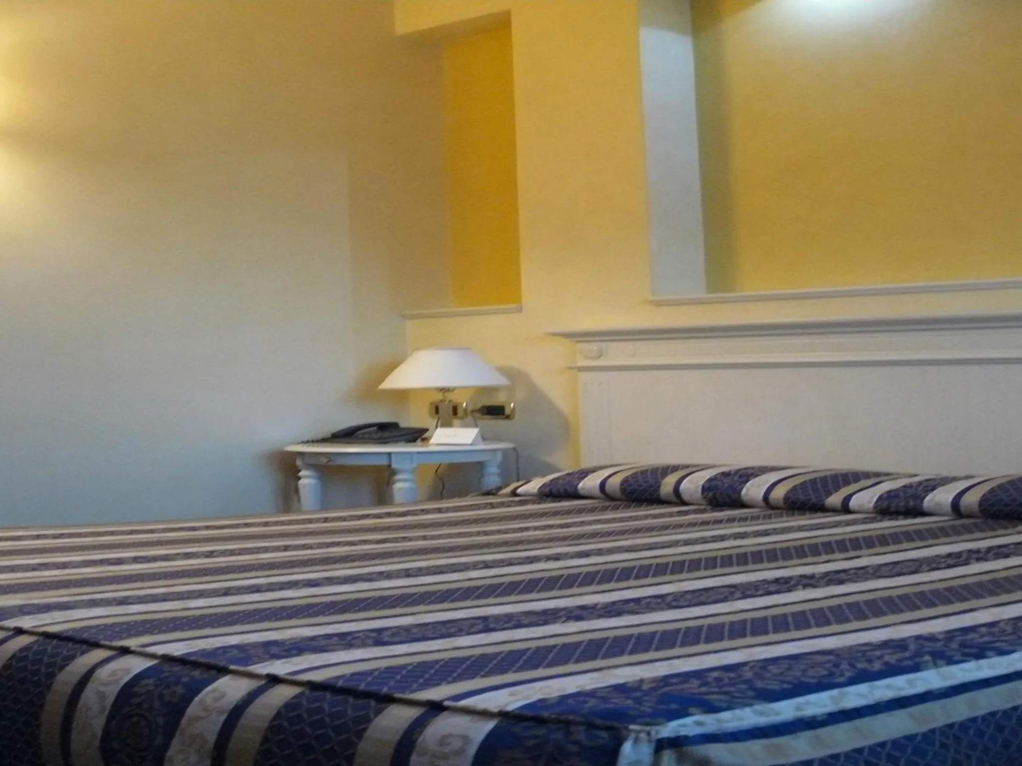 Bed in Albergo Milano