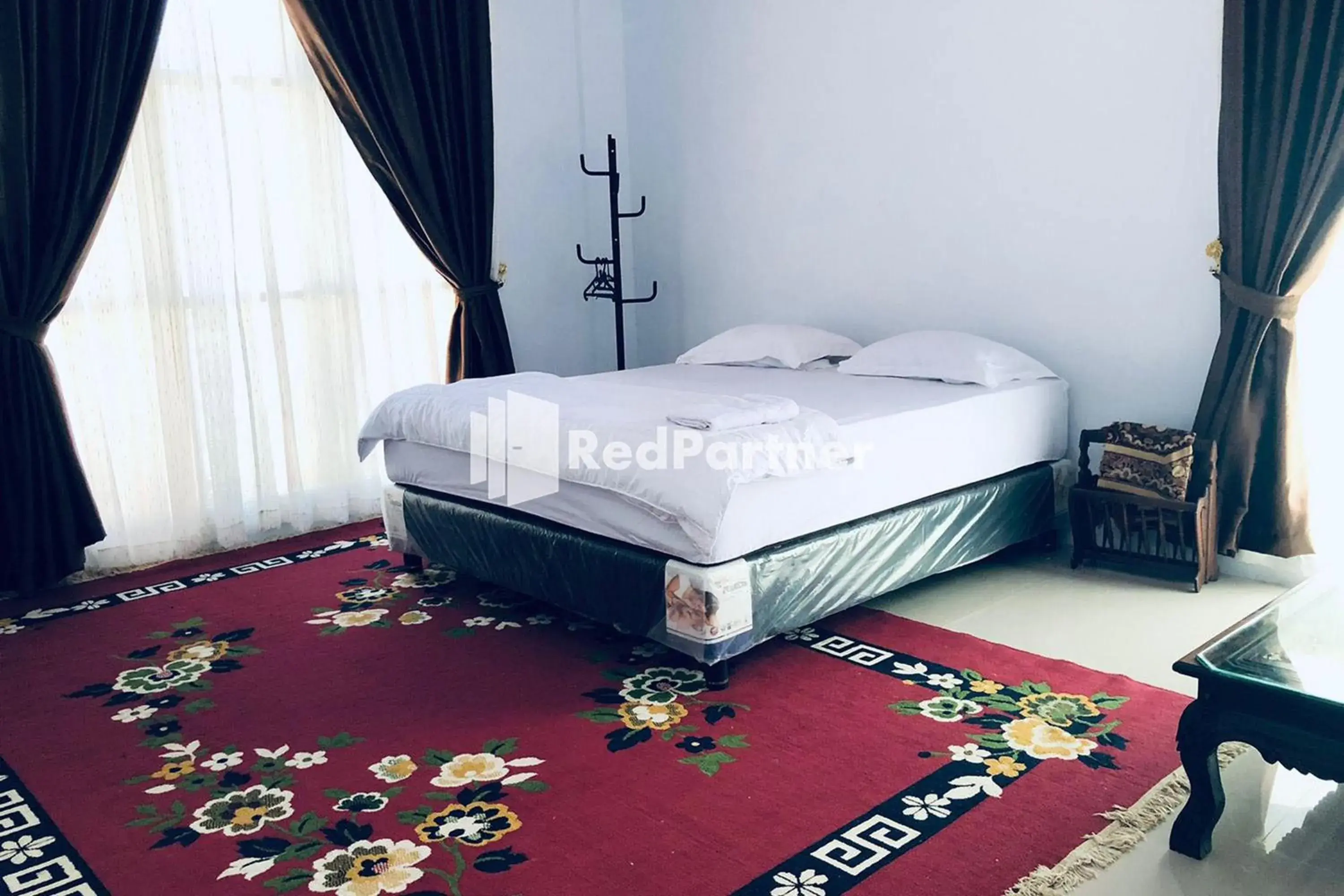 Bed in Wisma Suci Syariah Polewali Mandar Mitra RedDoorz Bed in Wisma Suci Syariah Polewali Mandar Mitra RedDoorz