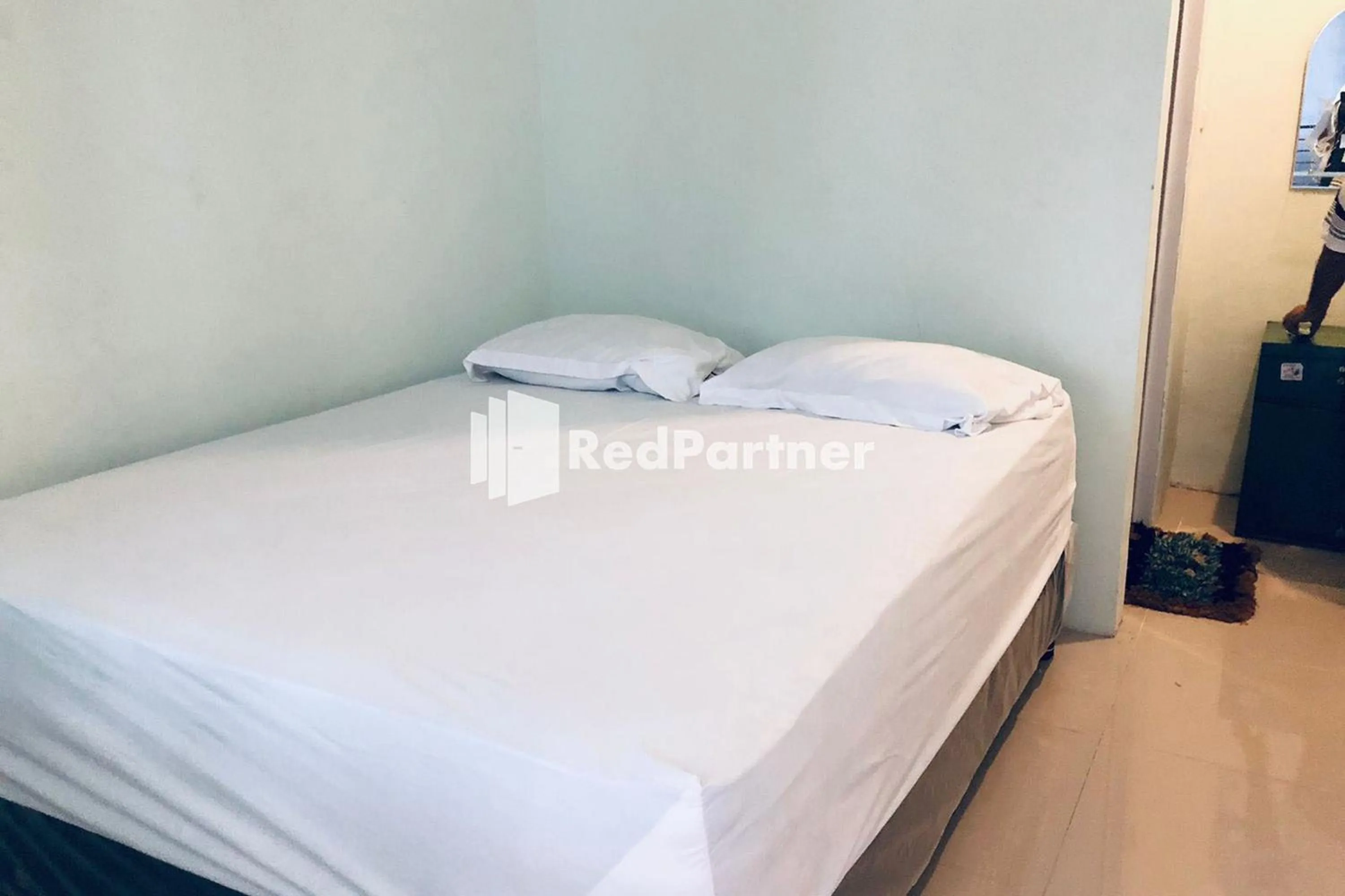 Bed in Wisma Suci Syariah Polewali Mandar Mitra RedDoorz