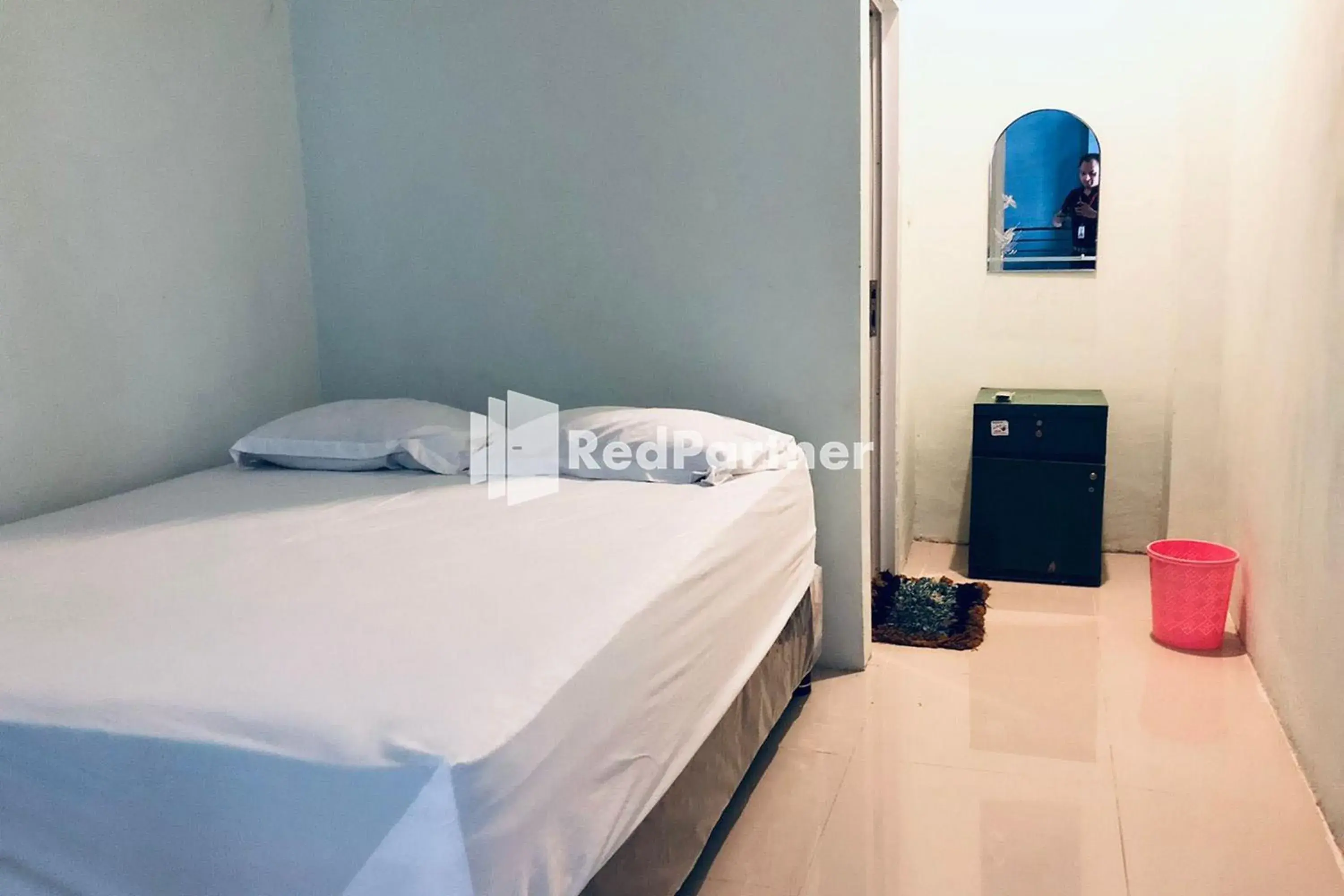 Bed in Wisma Suci Syariah Polewali Mandar Mitra RedDoorz Bed in Wisma Suci Syariah Polewali Mandar Mitra RedDoorz