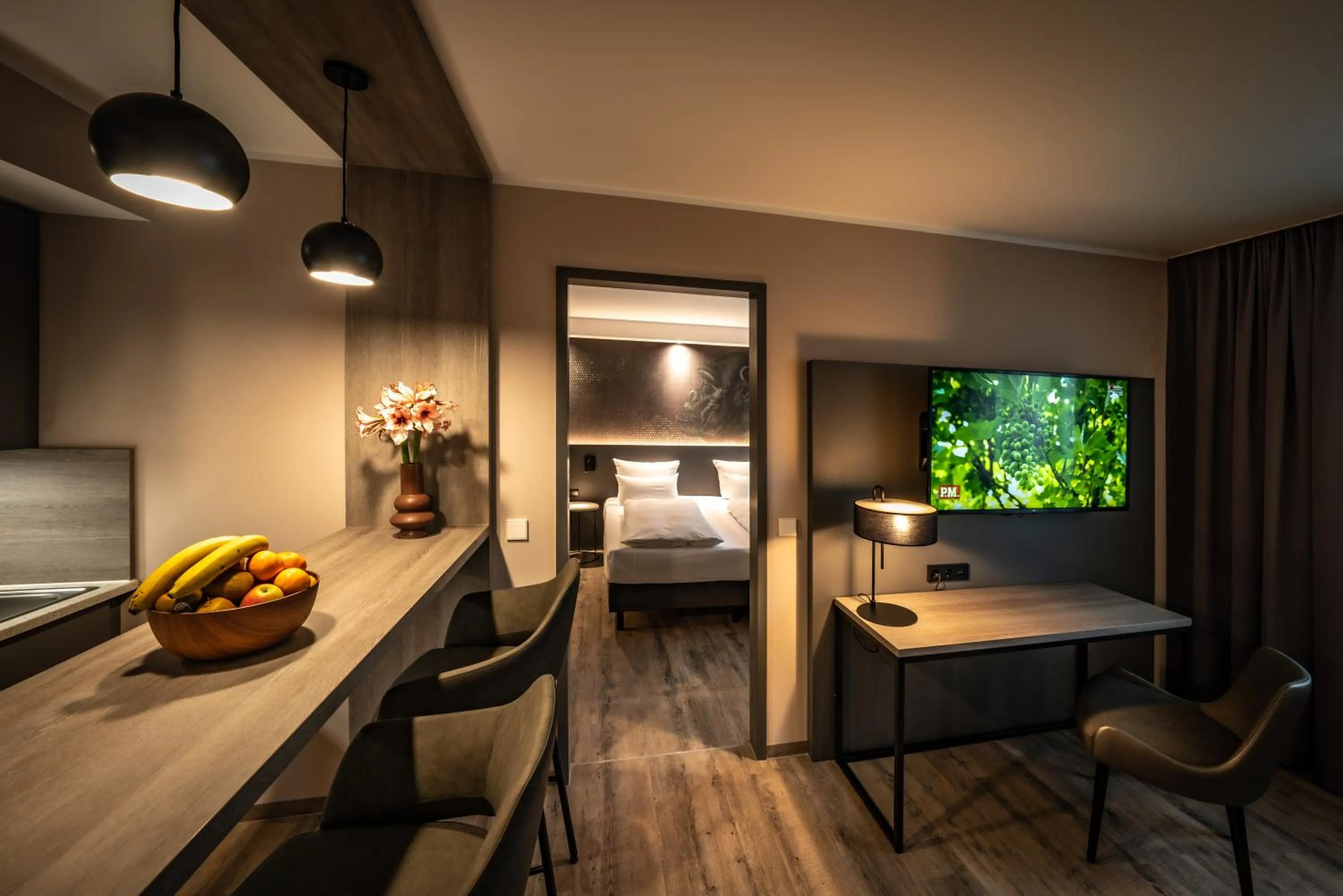 Living room, Bed in LOGINN Hotel Stuttgart Zuffenhausen