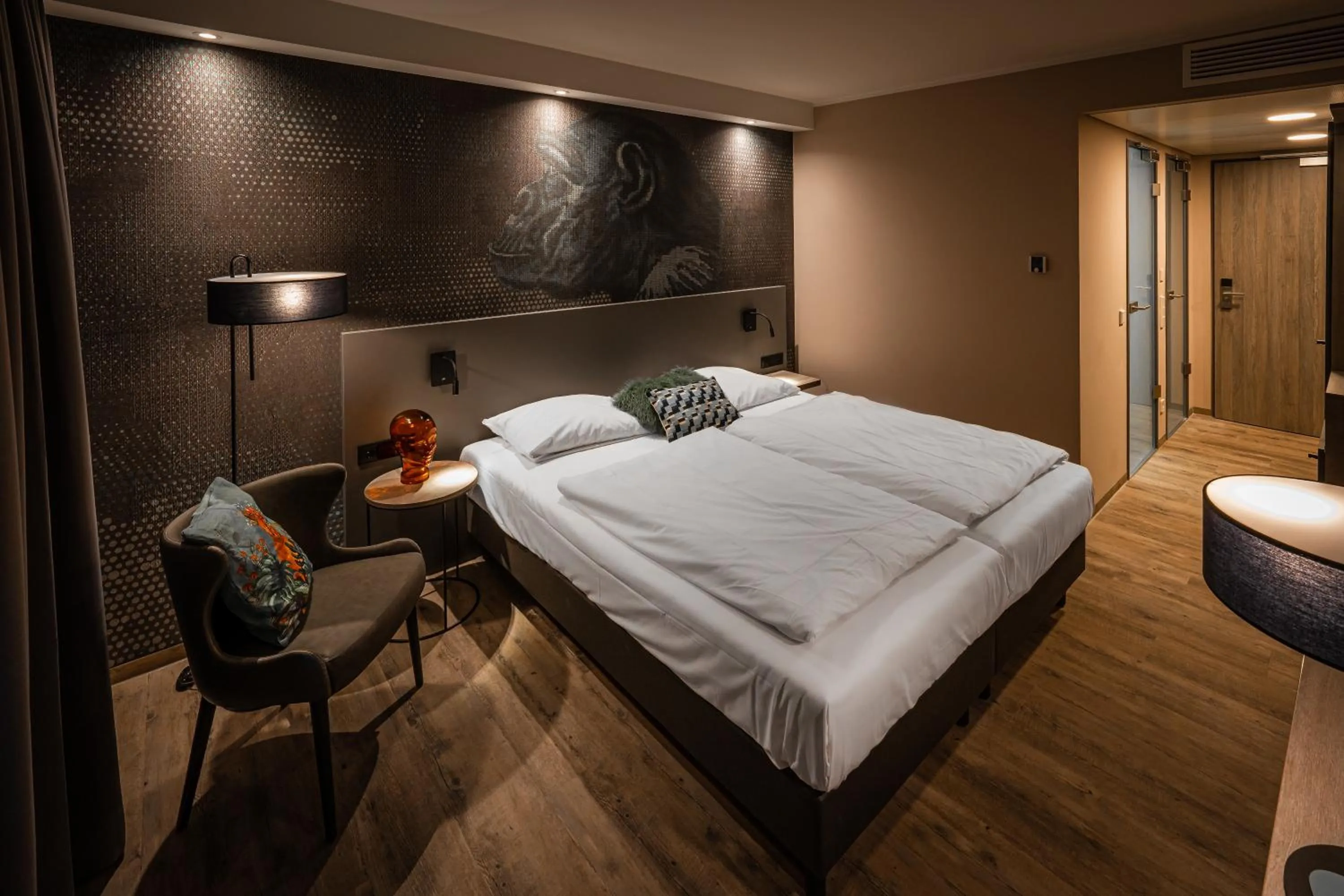 Bed in LOGINN Hotel Stuttgart Zuffenhausen