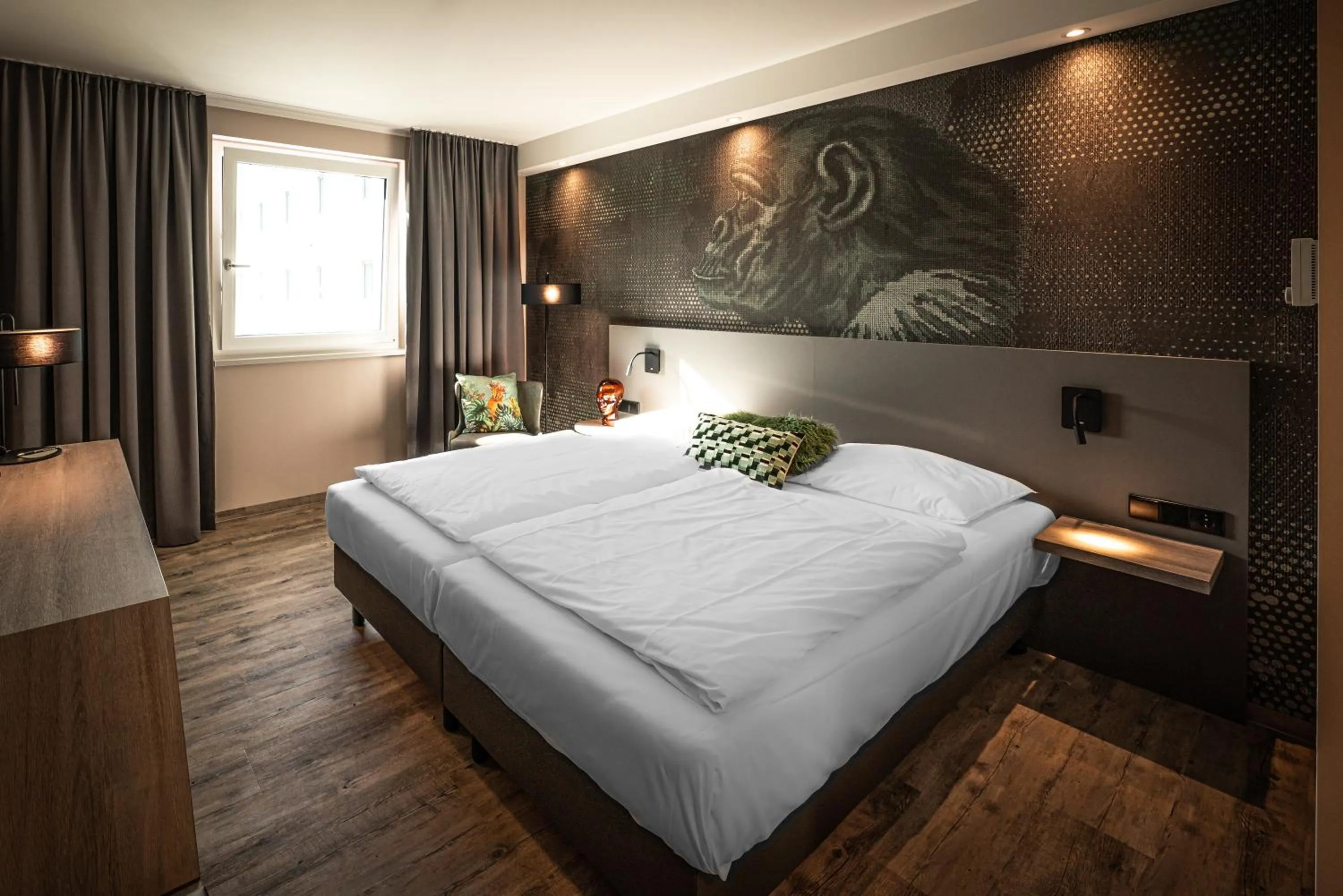 Bed in LOGINN Hotel Stuttgart Zuffenhausen