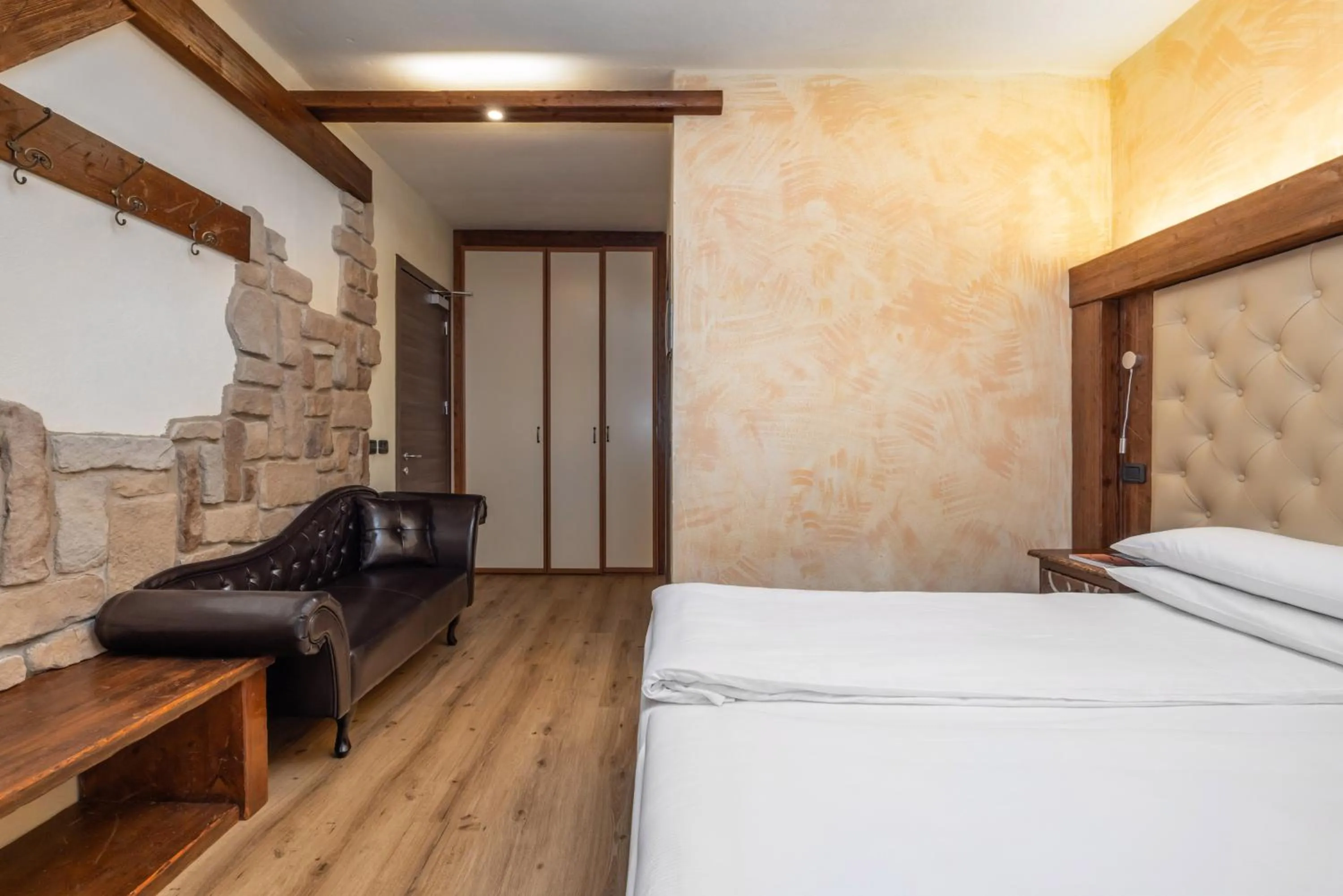 Bed in Garden Wellness Hotel S