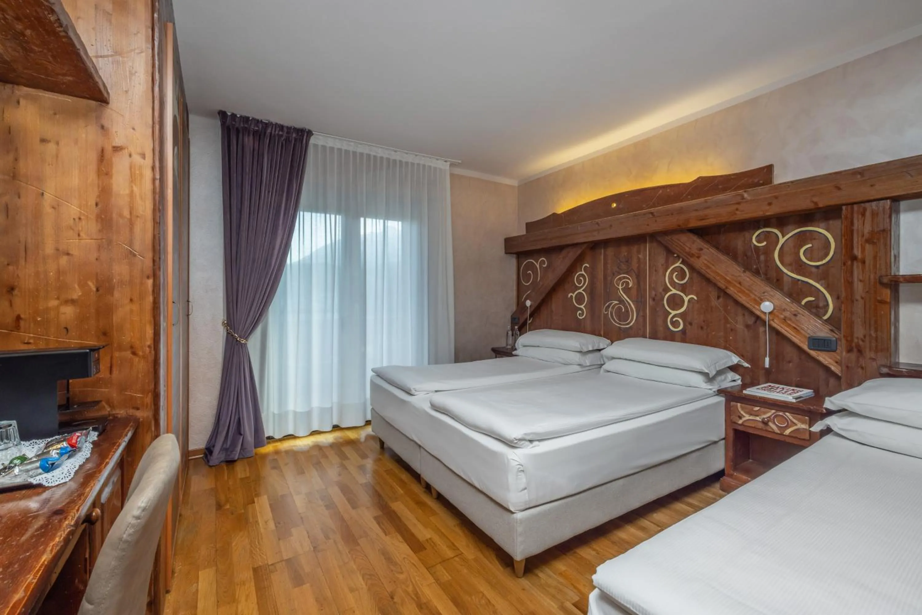 Bed in Garden Wellness Hotel S