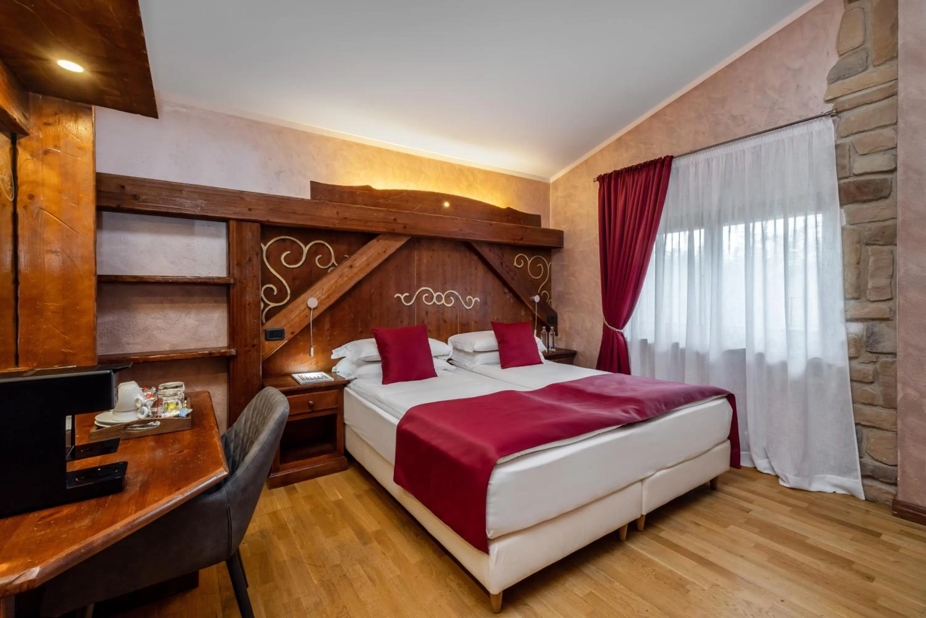 Bed in Garden Wellness Hotel S