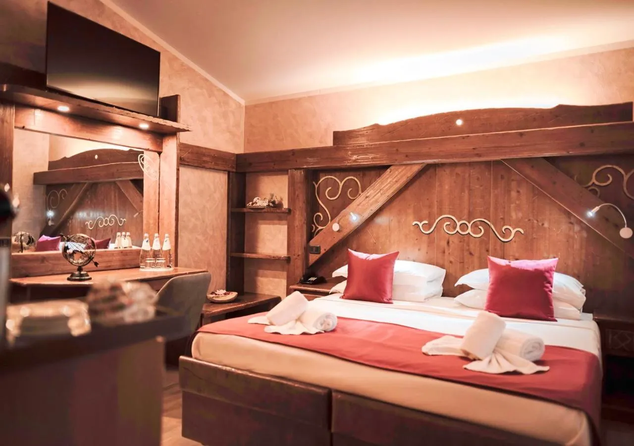 Bed in Garden Wellness Hotel S