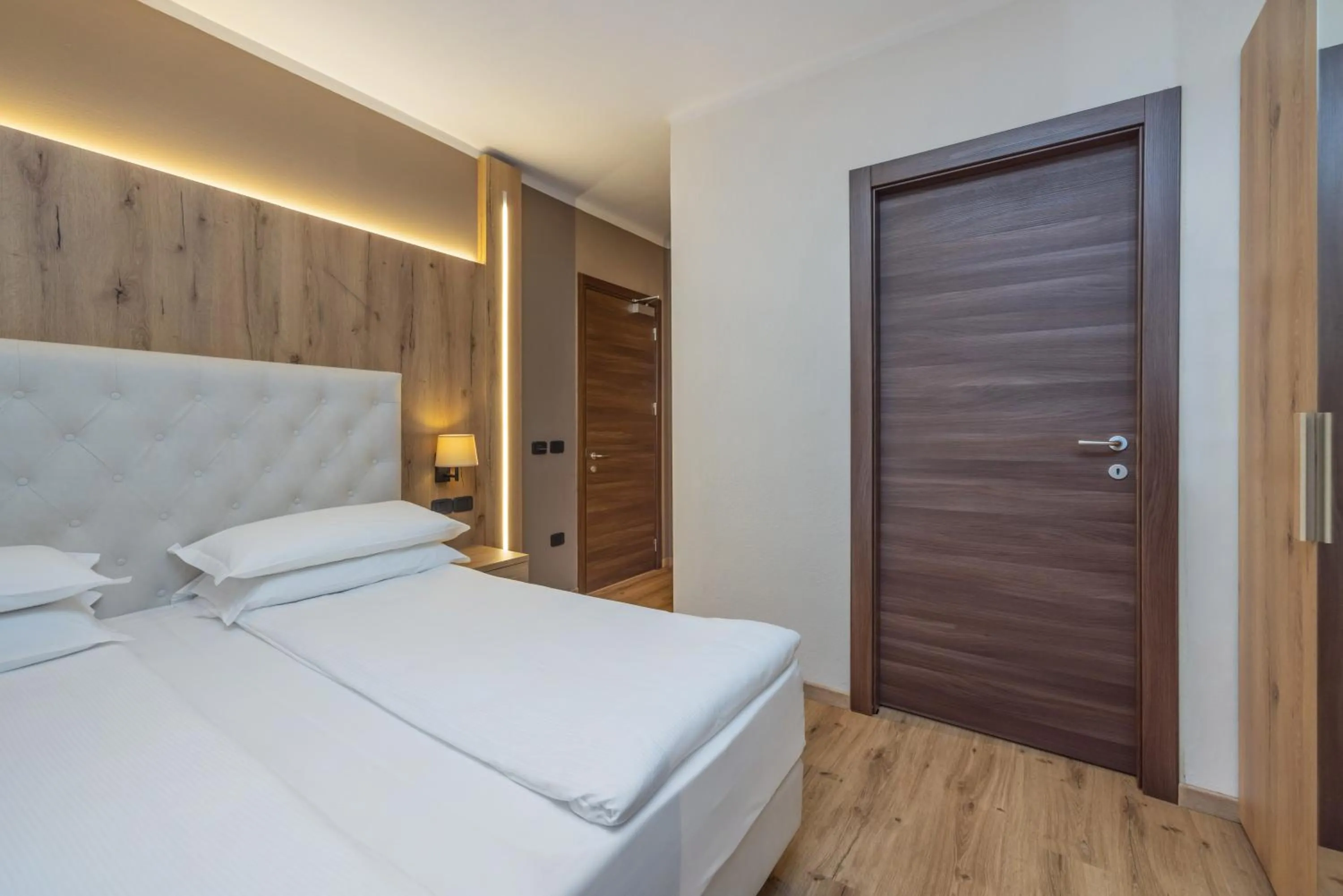 Bed in Garden Wellness Hotel S