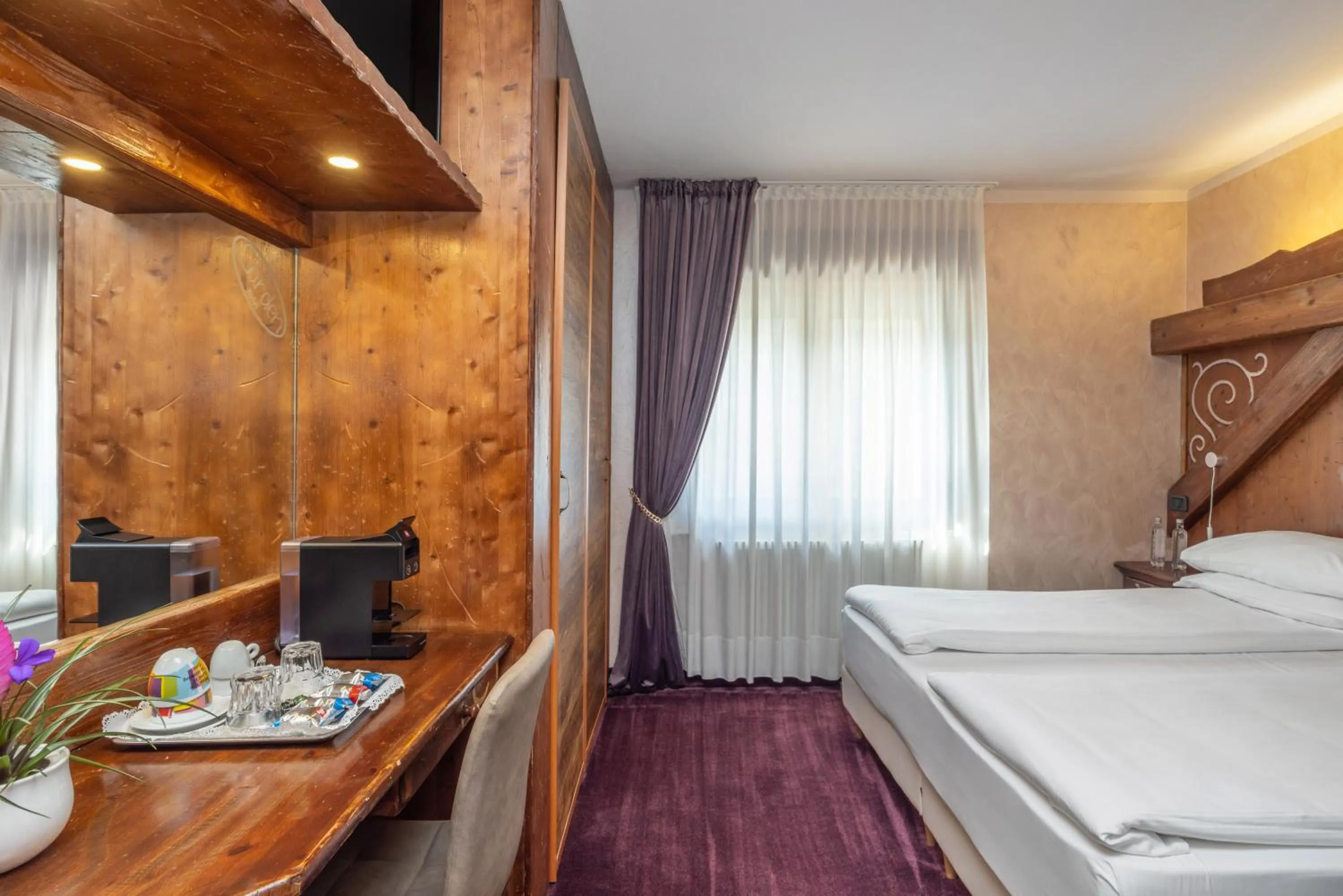 Bed in Garden Wellness Hotel S