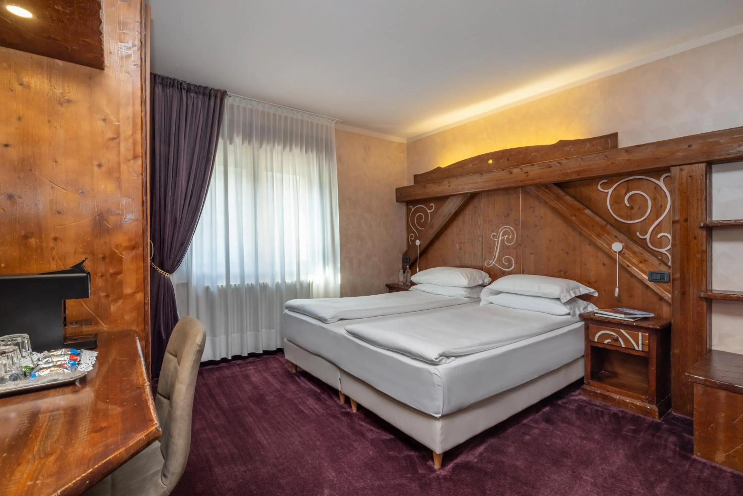 Bed in Garden Wellness Hotel S