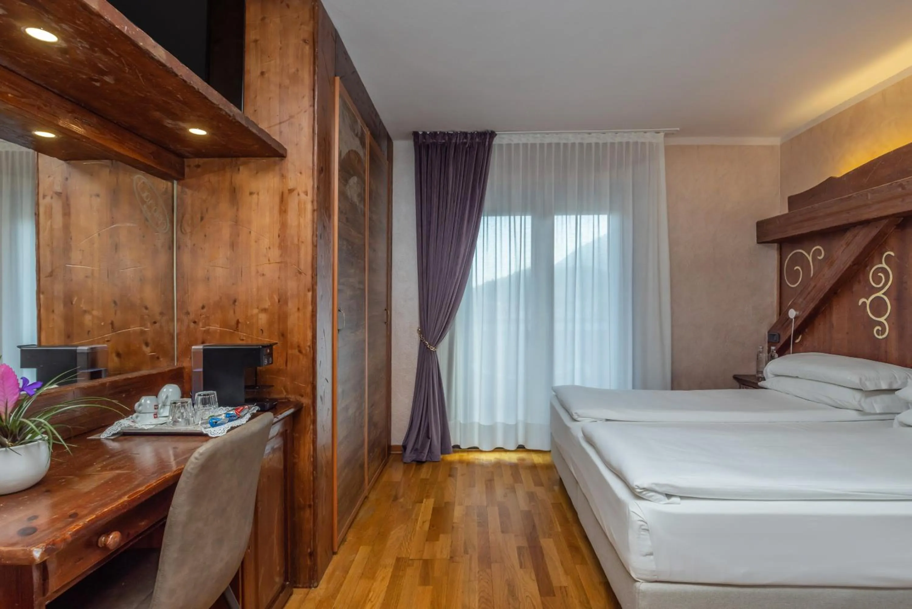 Bed in Garden Wellness Hotel S