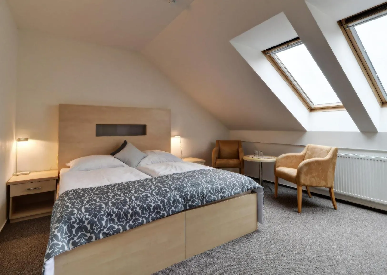 Bed in Hotel U Pramenu