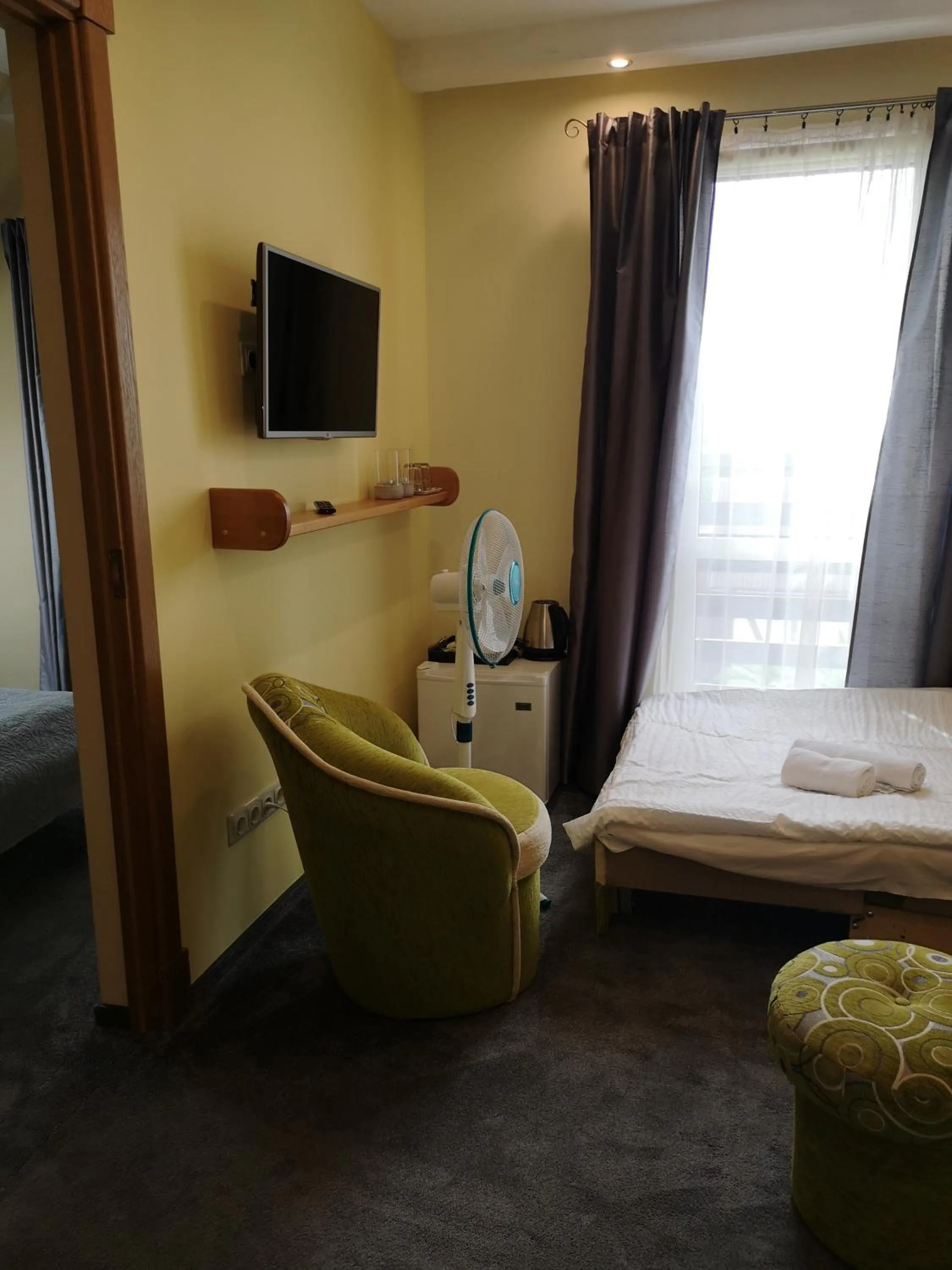 Living room, Bed in Hotel Senlīči