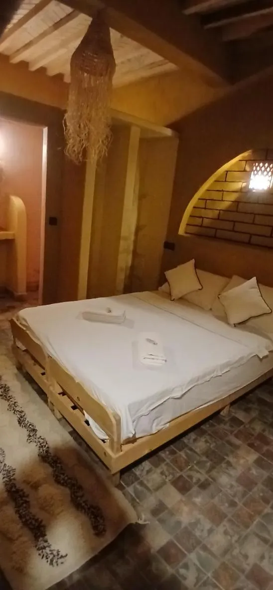 Bed in Auberge Kasbah Dar Sahara Tours