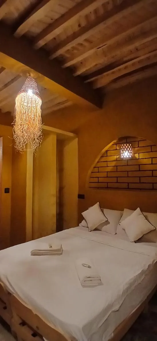 Bed in Auberge Kasbah Dar Sahara Tours