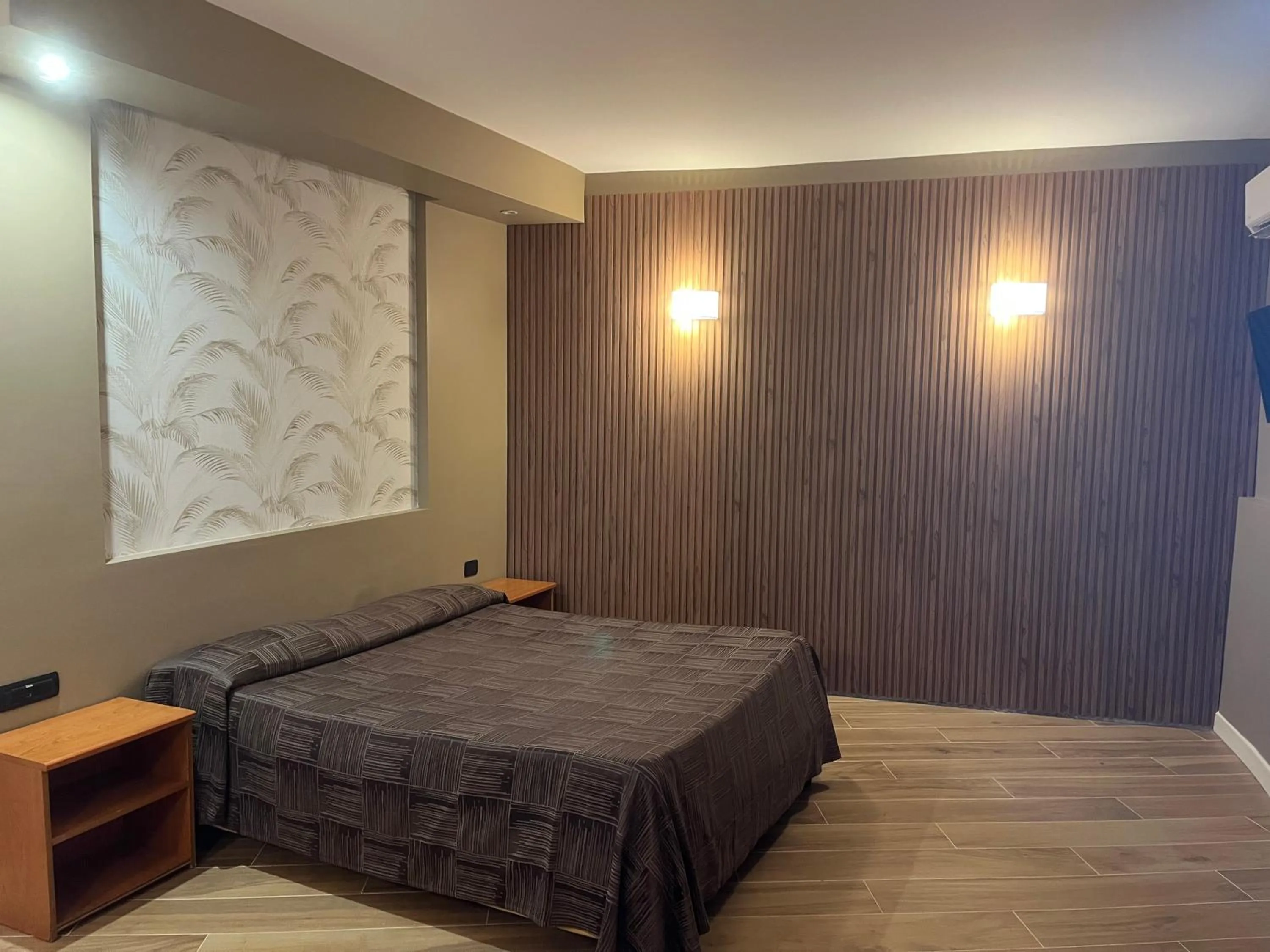 Bed in Hotel Ginepro