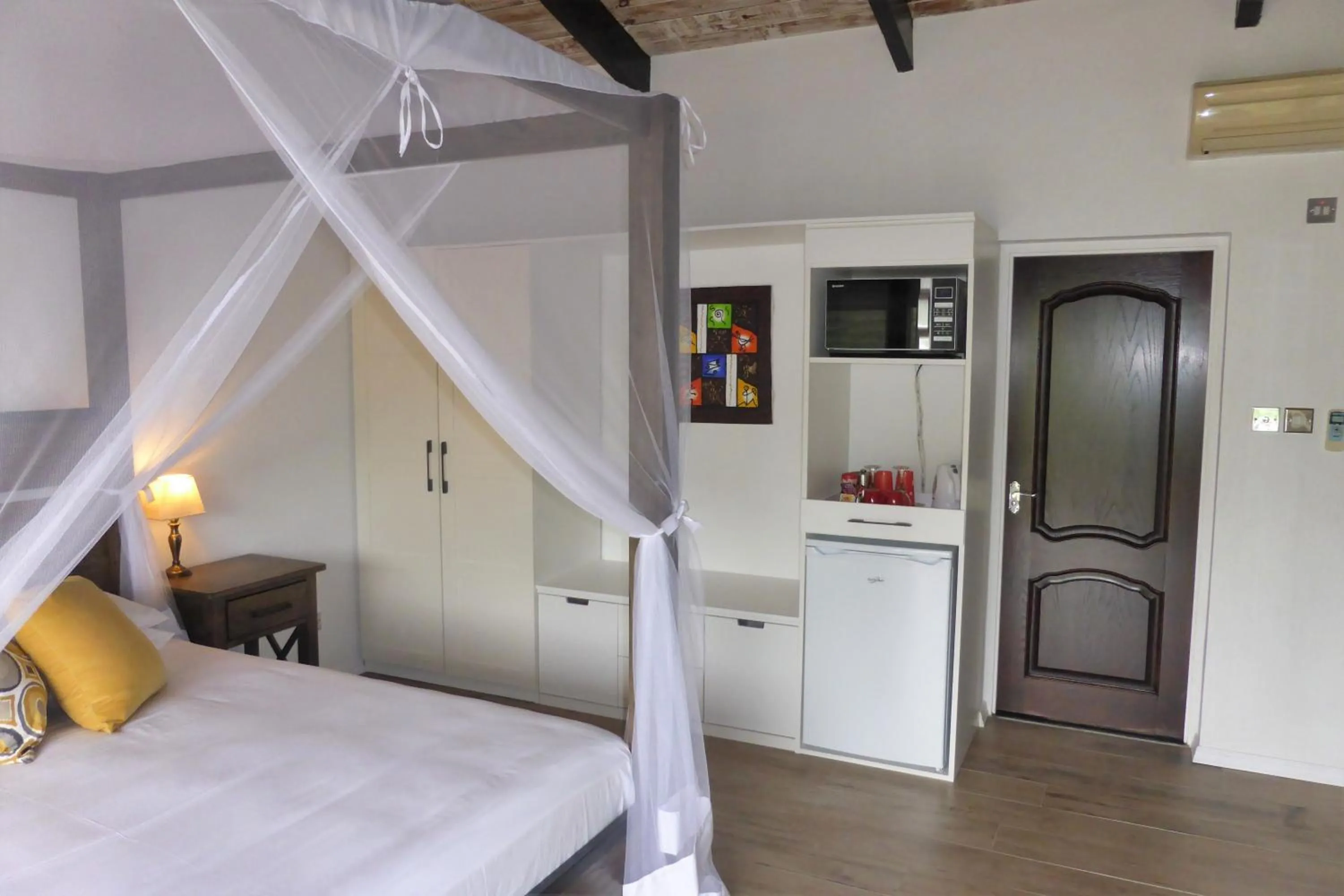 Coffee/tea facilities, Bed in Marigot Palms Luxury Caribbean Apartment Suites