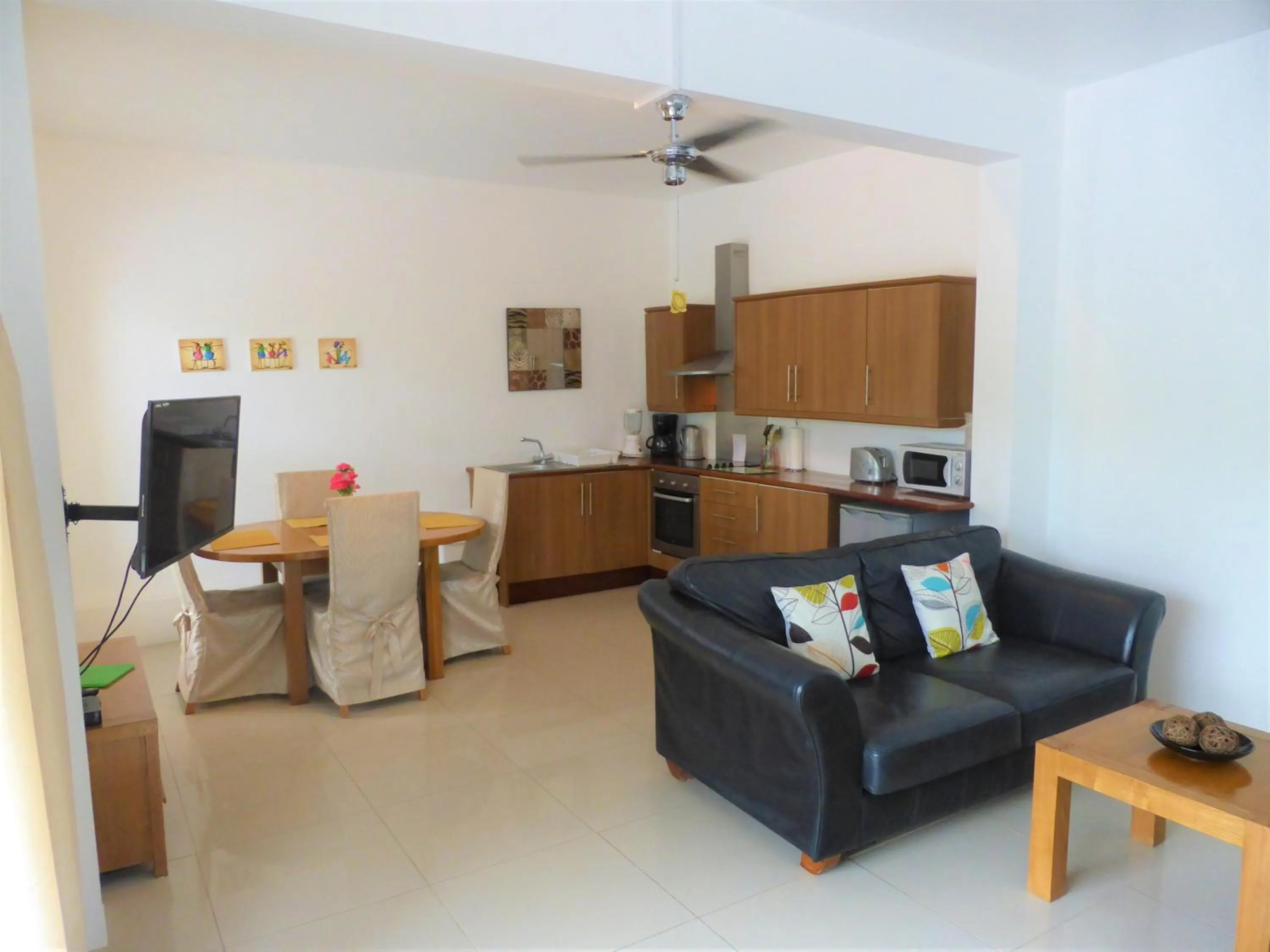 Photo of the whole room in Marigot Palms Luxury Caribbean Apartment Suites