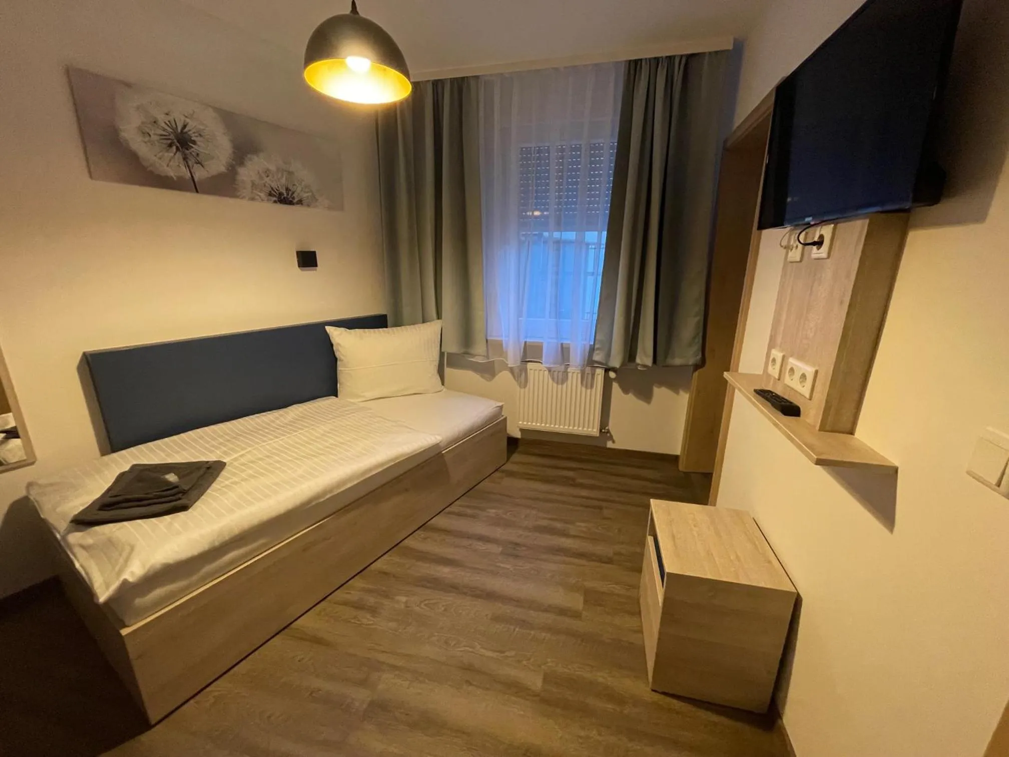 Photo of the whole room, Bed in Hotel Central City Hbf Nürnberg Garni