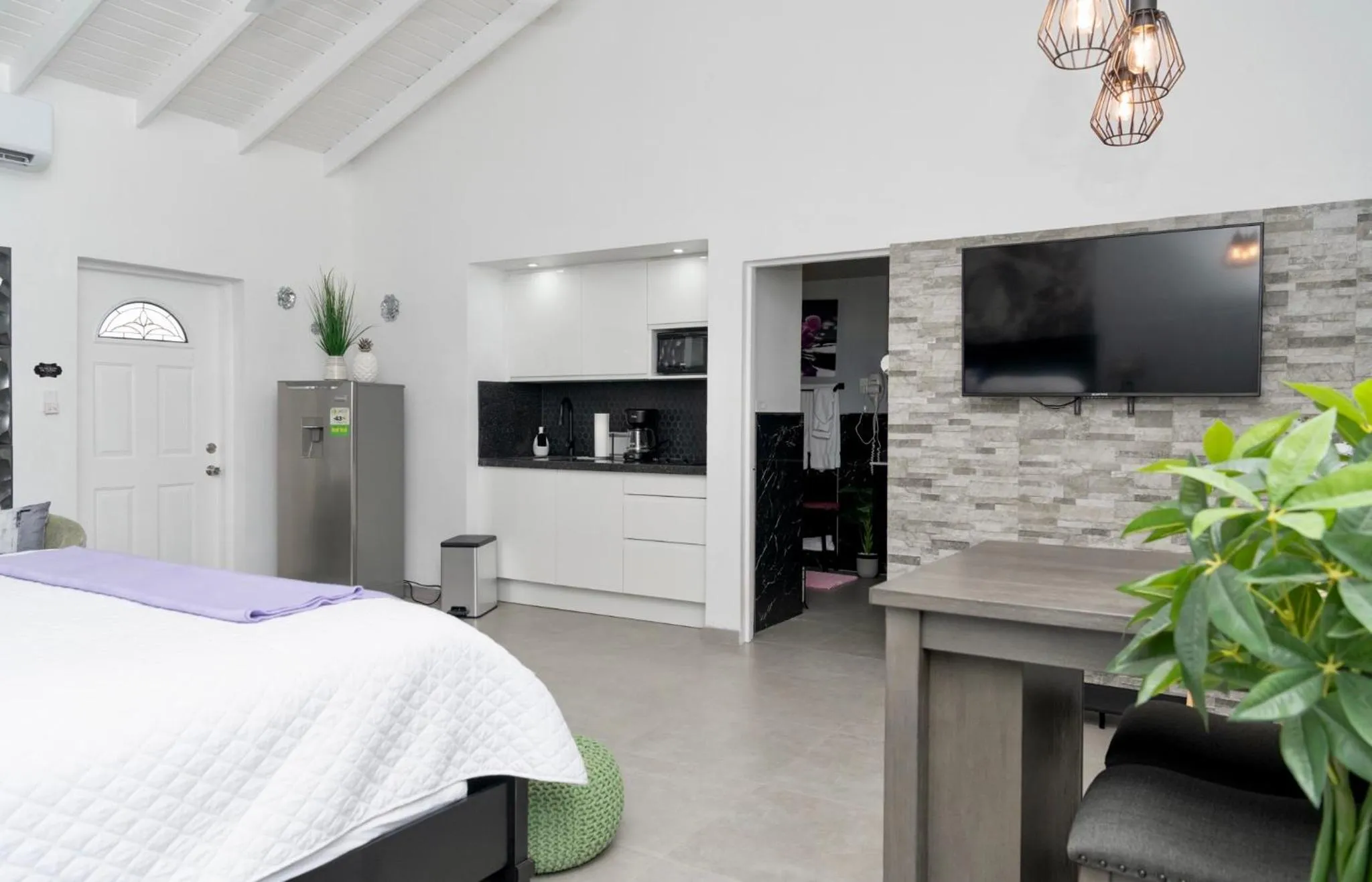 Bed in Mary's Boon Beach Resort & Spa