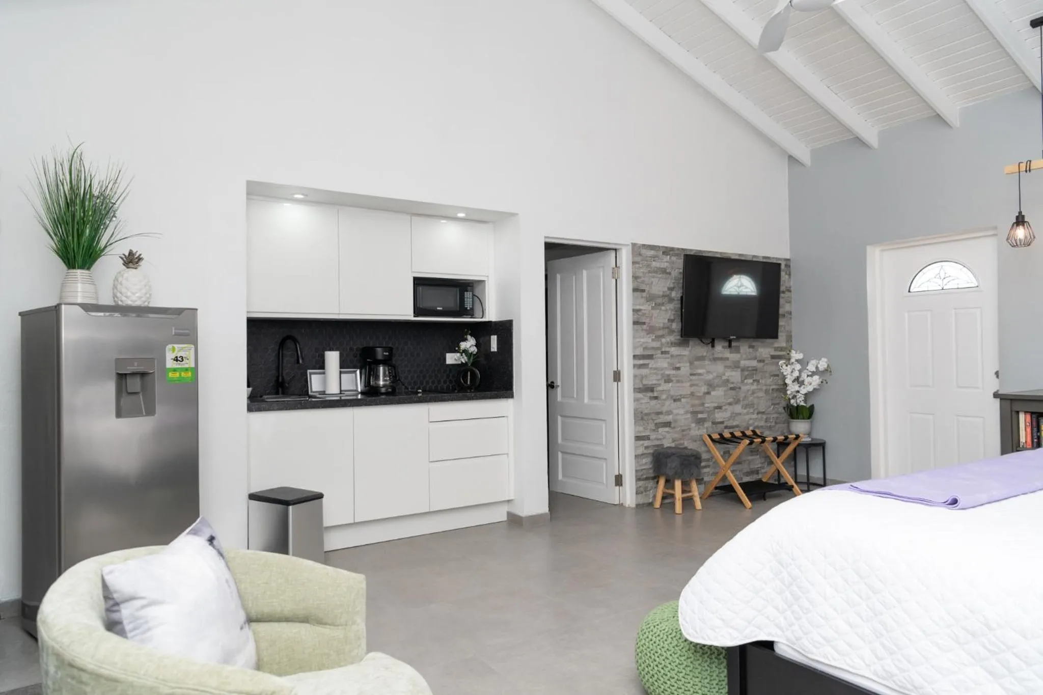 Bed in Mary's Boon Beach Resort & Spa