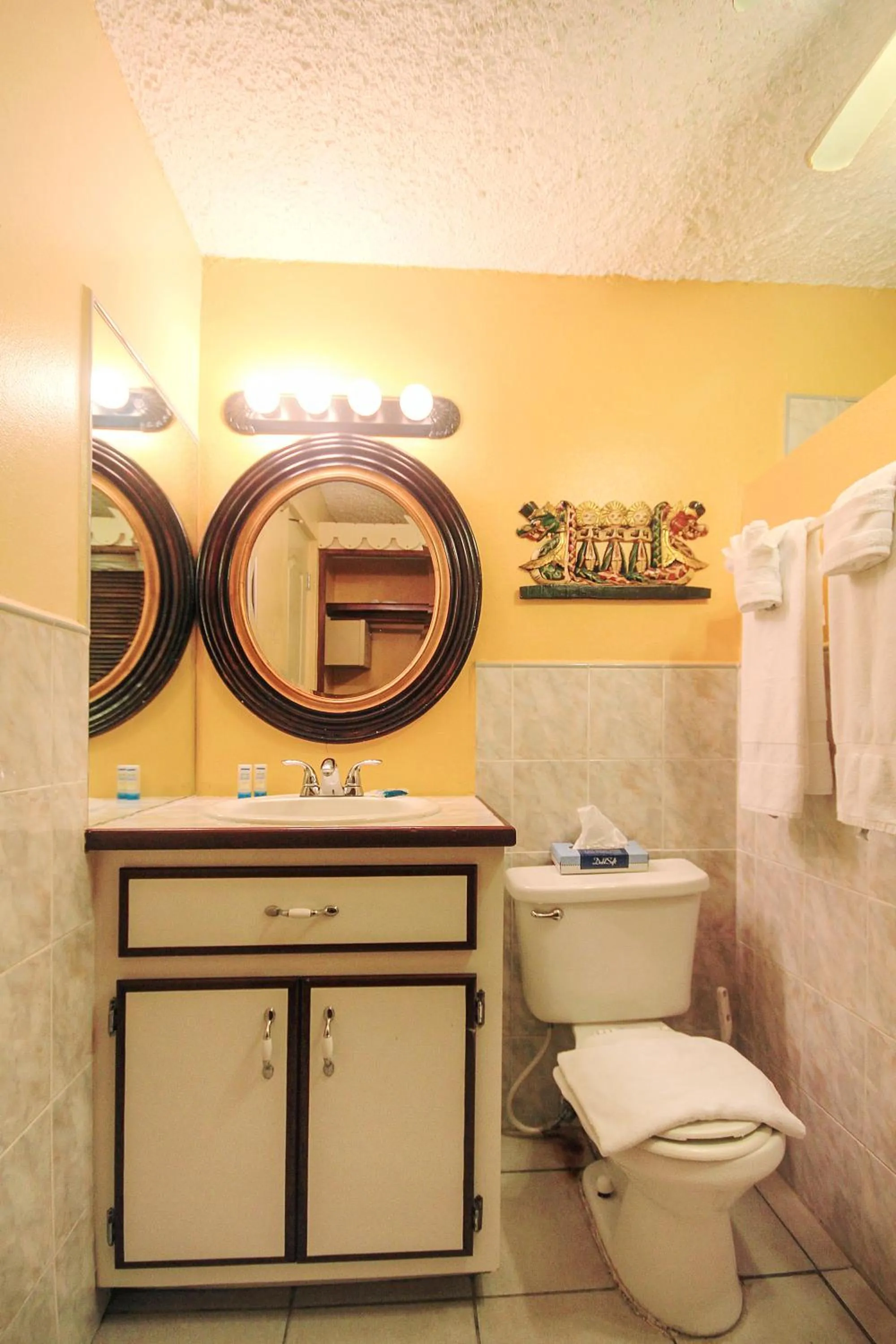 Toilet in Mary's Boon Beach Resort & Spa