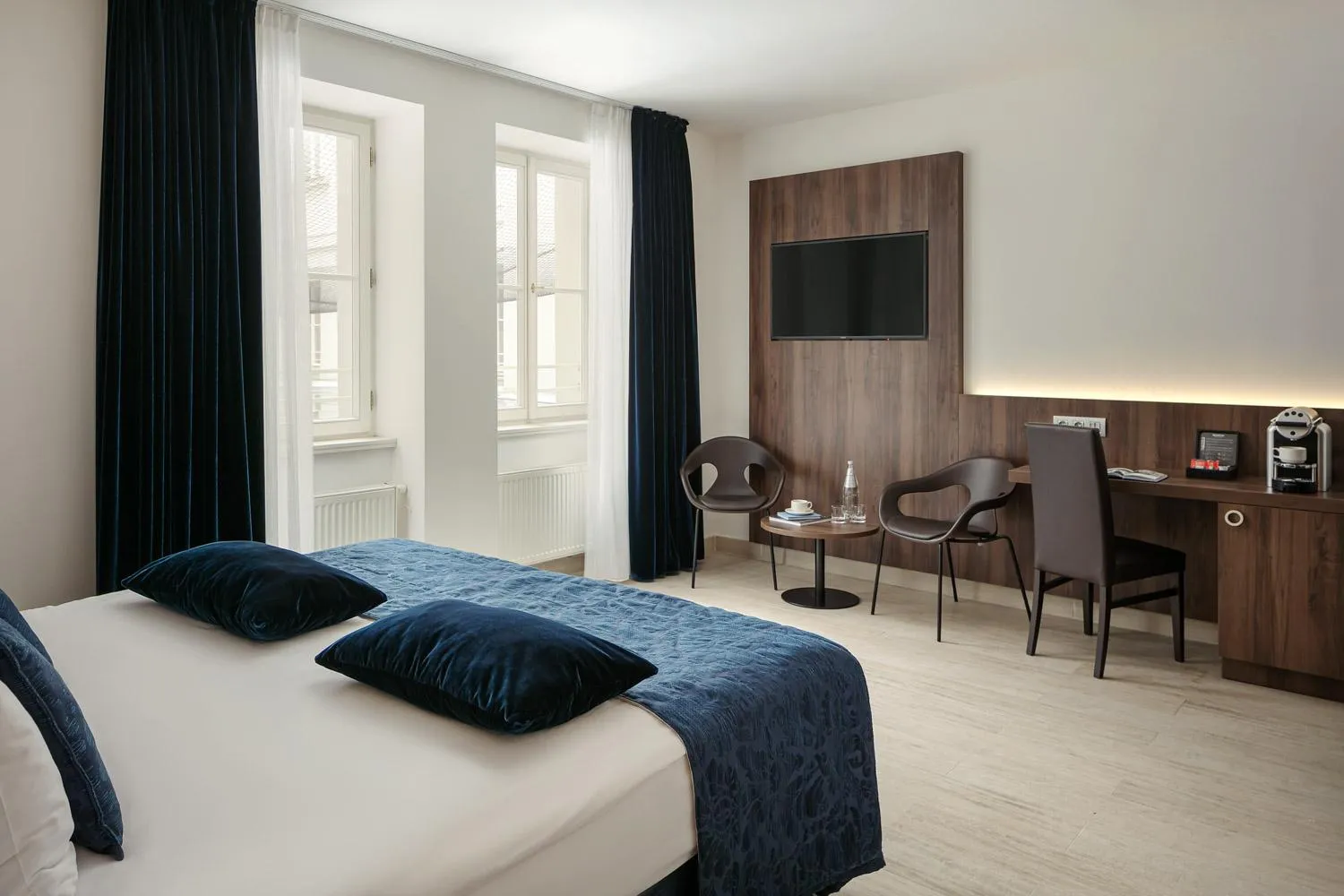 Bed in Michelangelo Grand Hotel