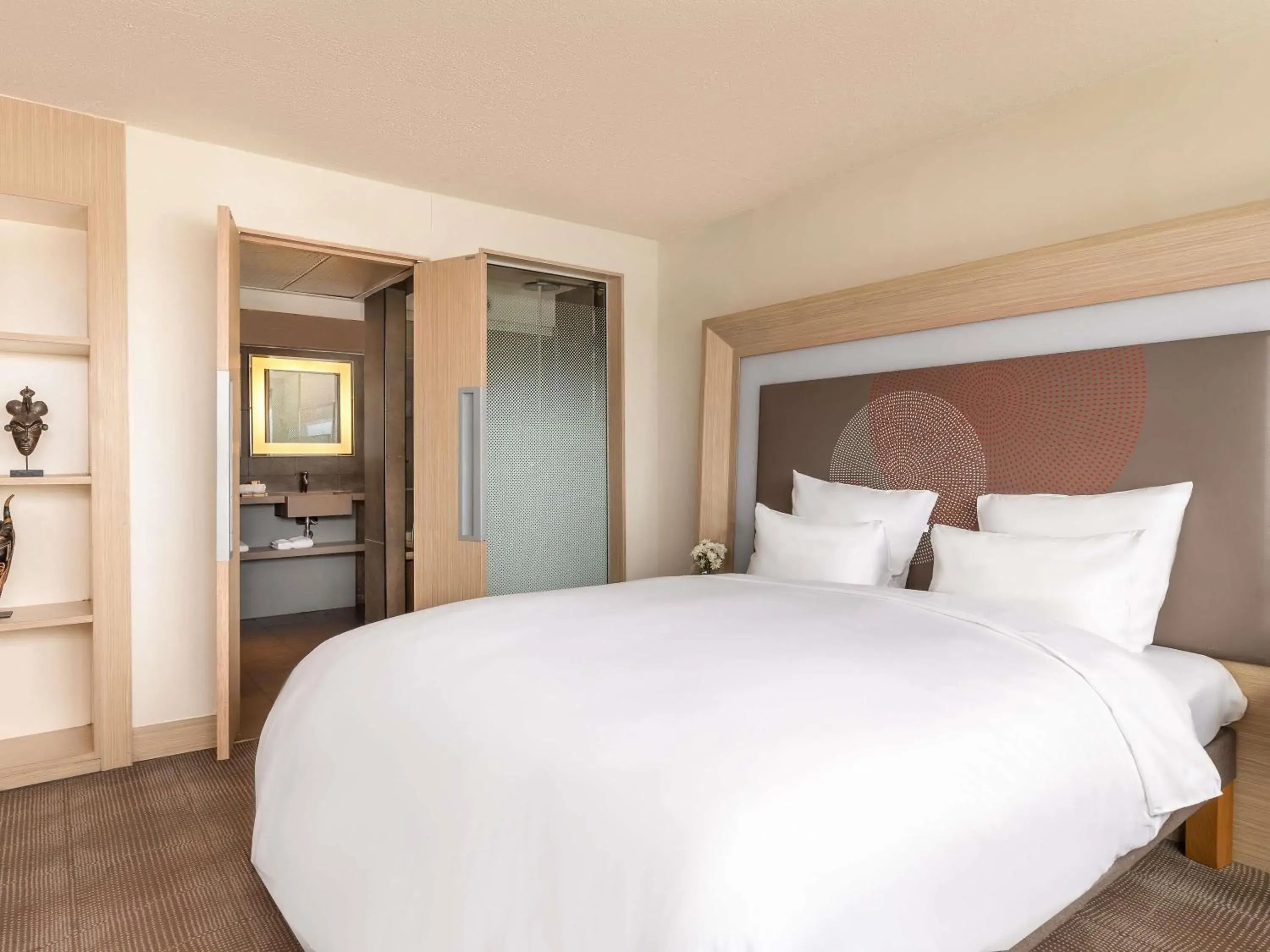 Bedroom, Bed in Novotel Abidjan Plateau Bedroom, Bed in Novotel Abidjan Plateau