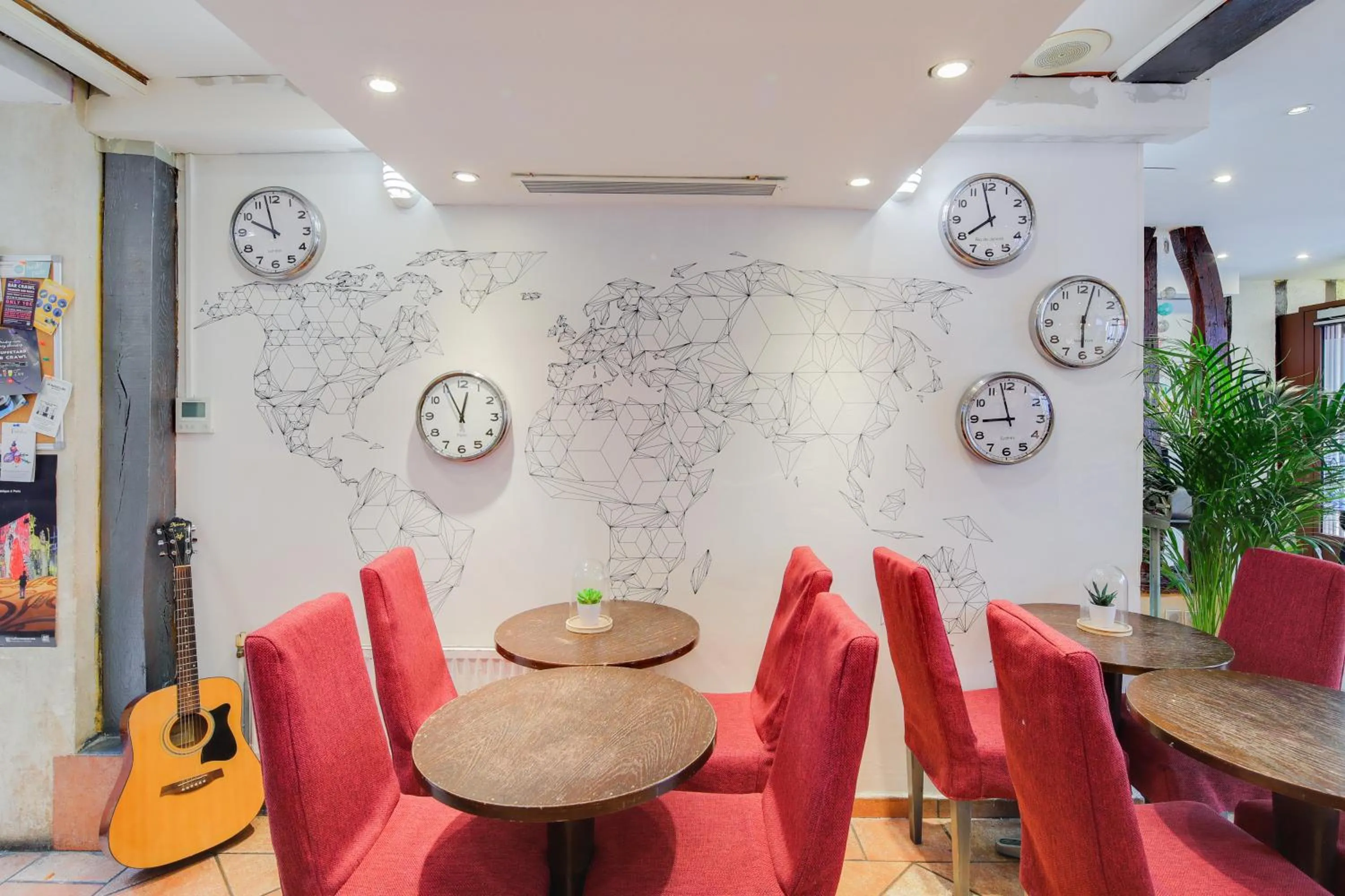 Communal lounge/ TV room in Le Village Montmartre by Hiphophostels