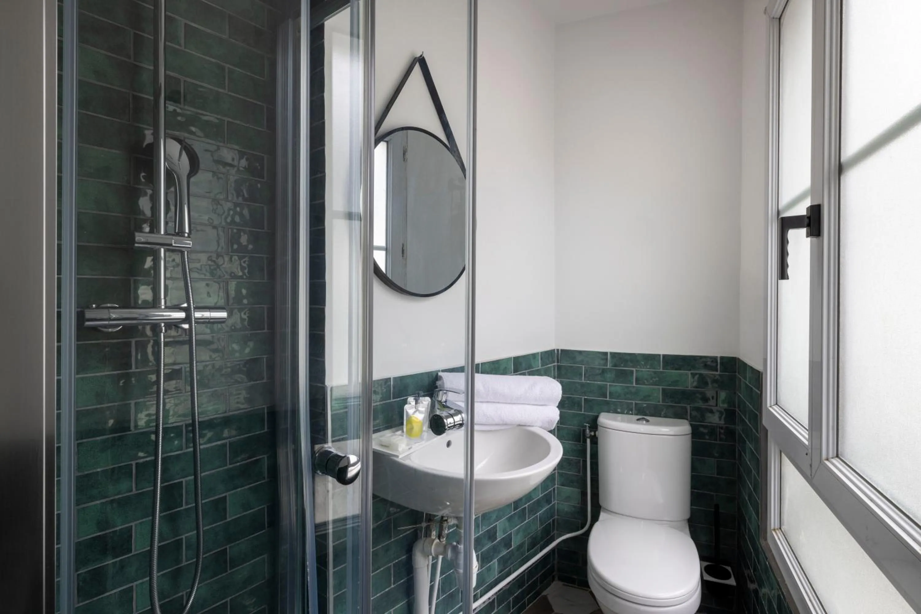 Shower in Le Village Montmartre by Hiphophostels