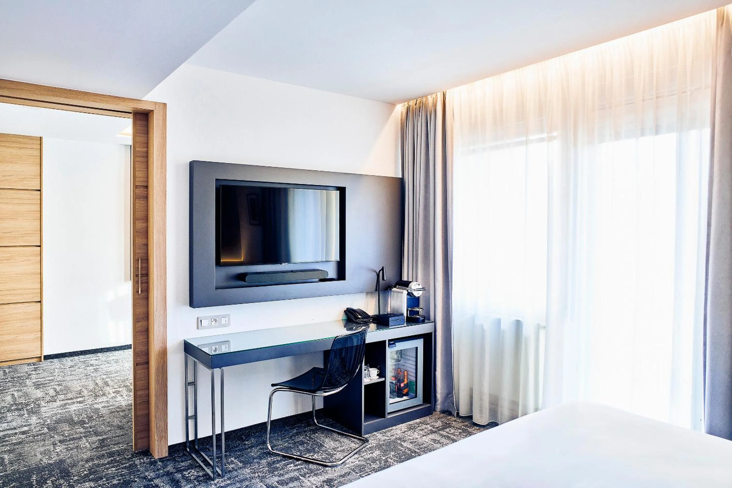 Living room, Bed in Hotel International Brno