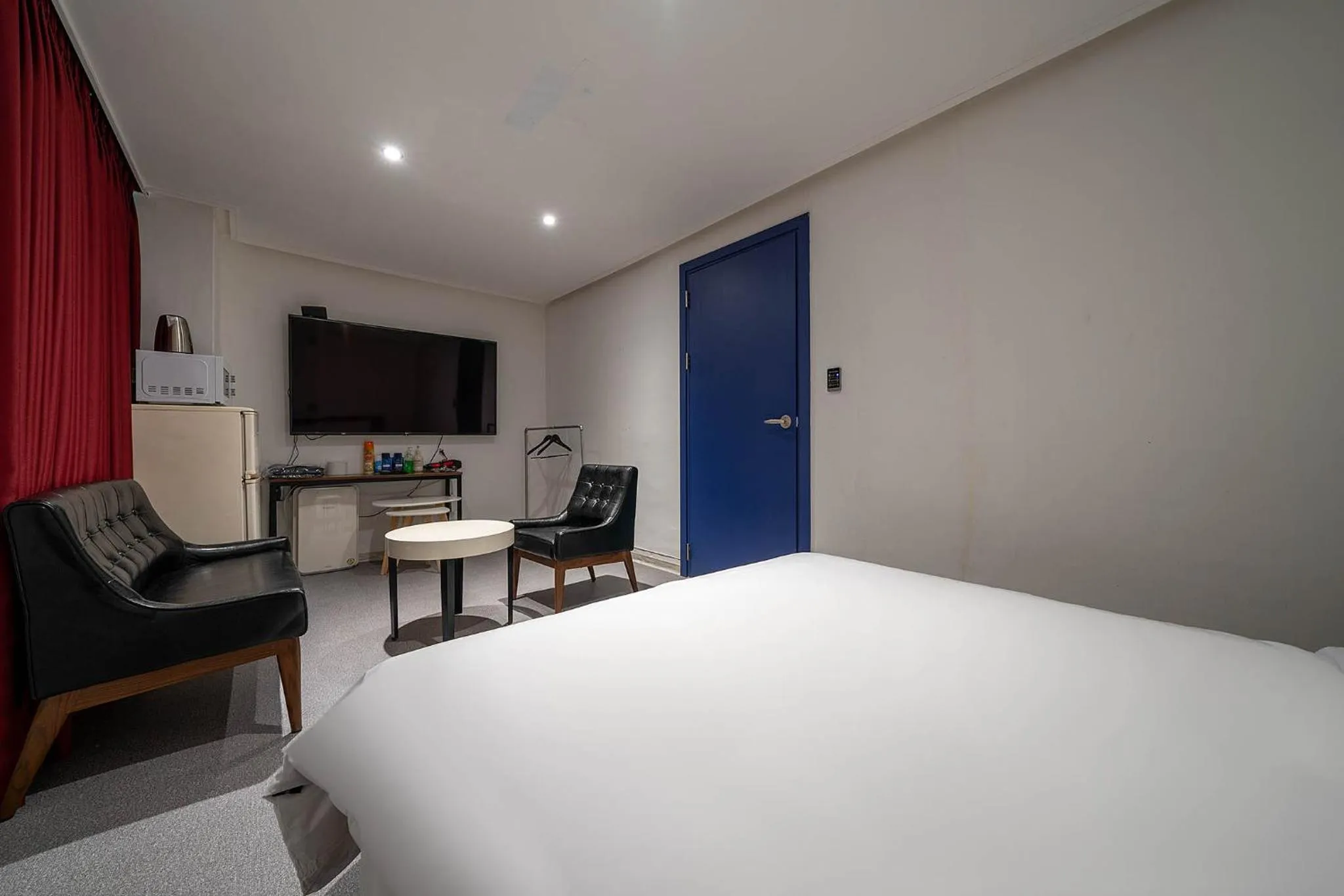 Bed in Pacific7 Hotel