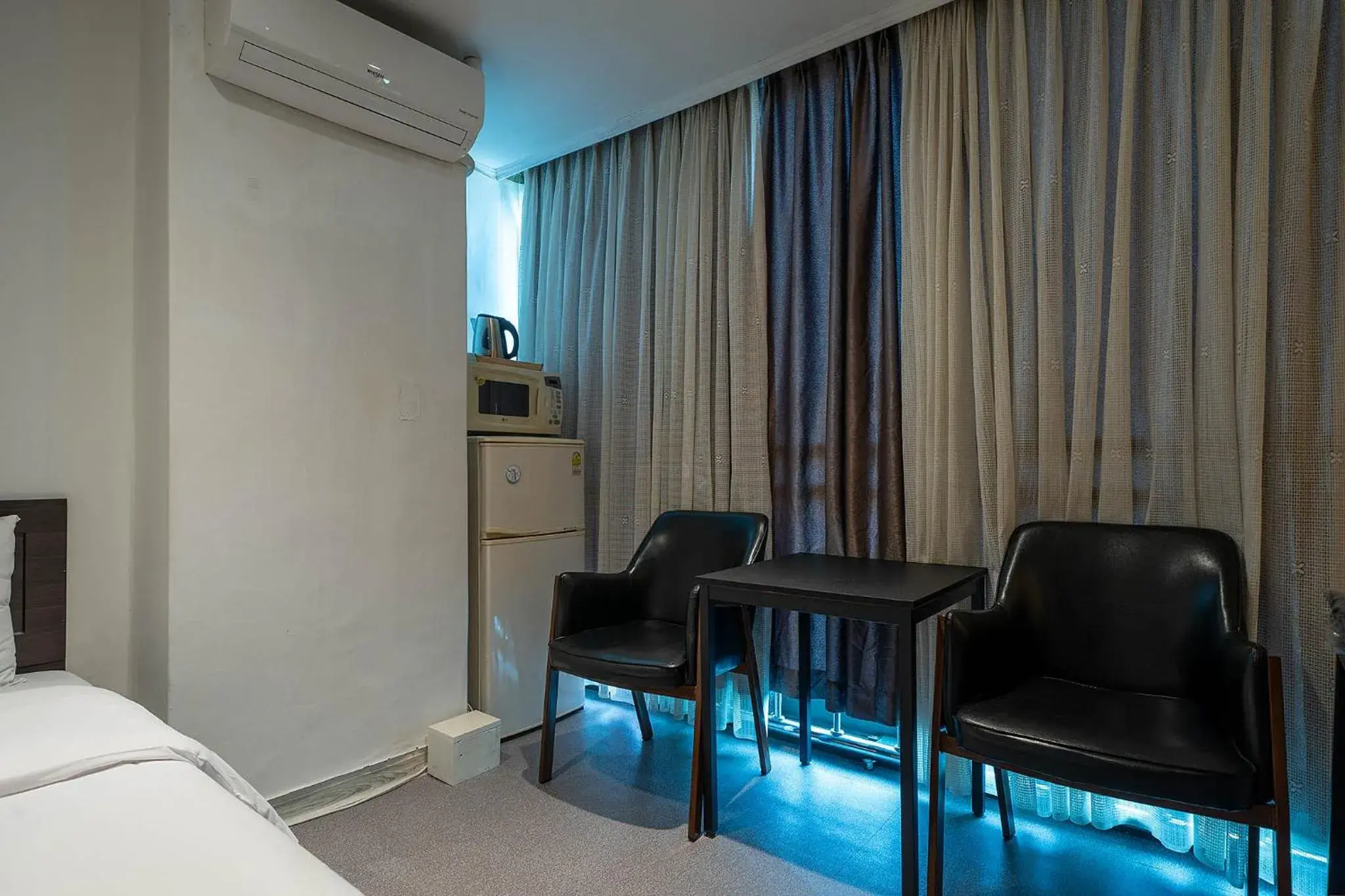 Bed in Pacific7 Hotel Bed in Pacific7 Hotel